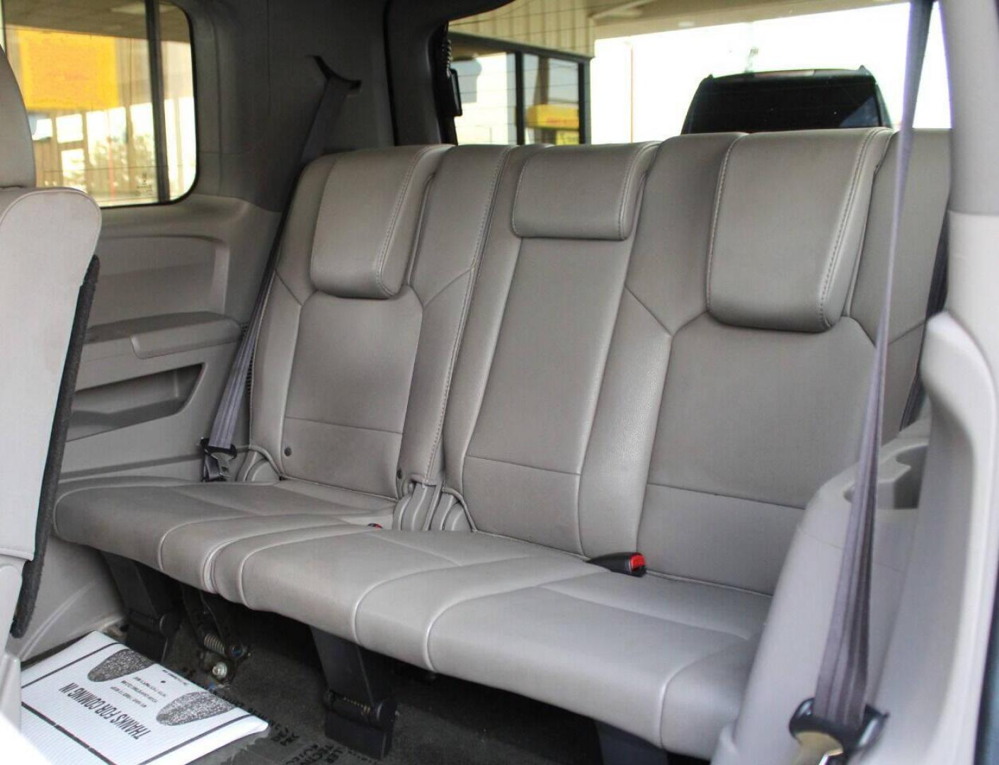 2013 Black Honda Pilot EX-L 4WD 5-Spd AT with DVD (5FNYF4H69DB) with an 3.5L V6 SOHC 24V engine, 5-Speed Automatic transmission, located at 4301 NW 39th , Oklahoma City, OK, 73112, (405) 949-5600, 35.512135, -97.598671 - NO DRIVERS LICENCE NO-FULL COVERAGE INSURANCE-NO CREDIT CHECK. COME ON OVER TO SUPERSPORTS AND TAKE A LOOK AND TEST DRIVE. PLEASE GIVE US A CALL AT (405) 949-5600. NO LICENSIA DE MANEJAR- NO SEGURO DE COBERTURA TOTAL- NO VERIFICACCION DE CREDITO. POR FAVOR VENGAN A SUPERSPORTS, ECHE UN - Photo#16