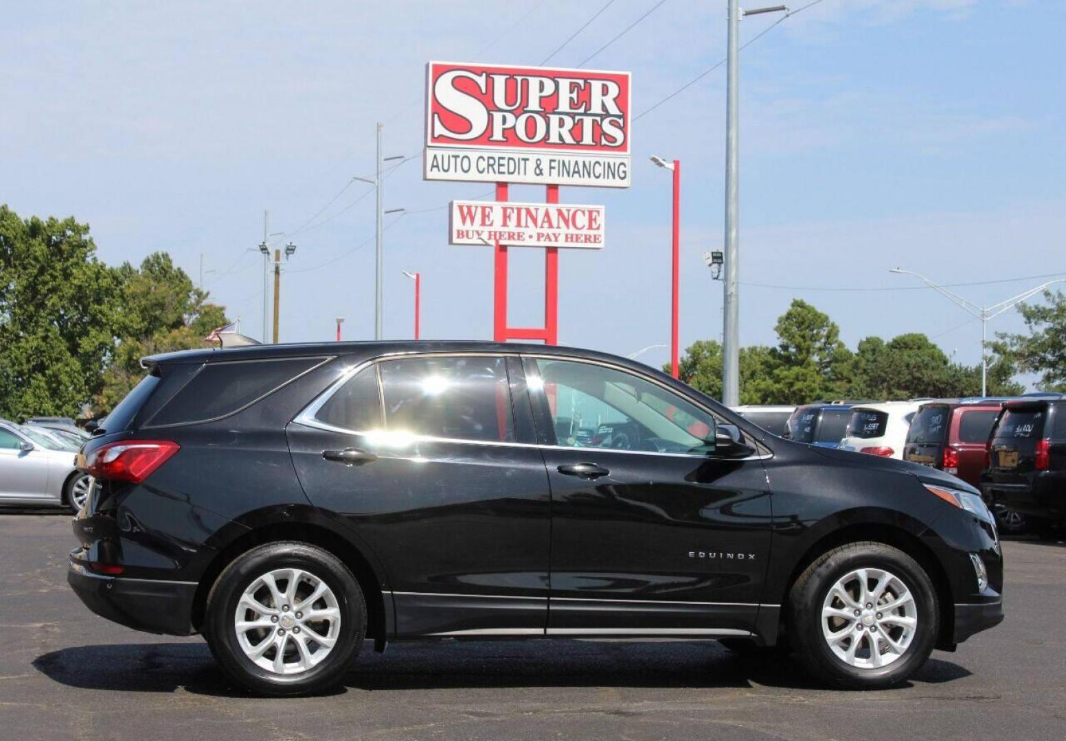 2018 Black Chevrolet Equinox LT AWD (2GNAXSEV7J6) with an 1.5L L4 DIR DOHC 16V TURBO engine, 6A transmission, located at 4301 NW 39th , Oklahoma City, OK, 73112, (405) 949-5600, 35.512135, -97.598671 - NO DRIVERS LICENCE NO-FULL COVERAGE INSURANCE-NO CREDIT CHECK. COME ON OVER TO SUPERSPORTS AND TAKE A LOOK AND TEST DRIVE. PLEASE GIVE US A CALL AT (405) 949-5600. NO LICENSIA DE MANEJAR- NO SEGURO DE COBERTURA TOTAL- NO VERIFICACCION DE CREDITO. POR FAVOR VENGAN A SUPERSPORTS, ECHE UN - Photo#4