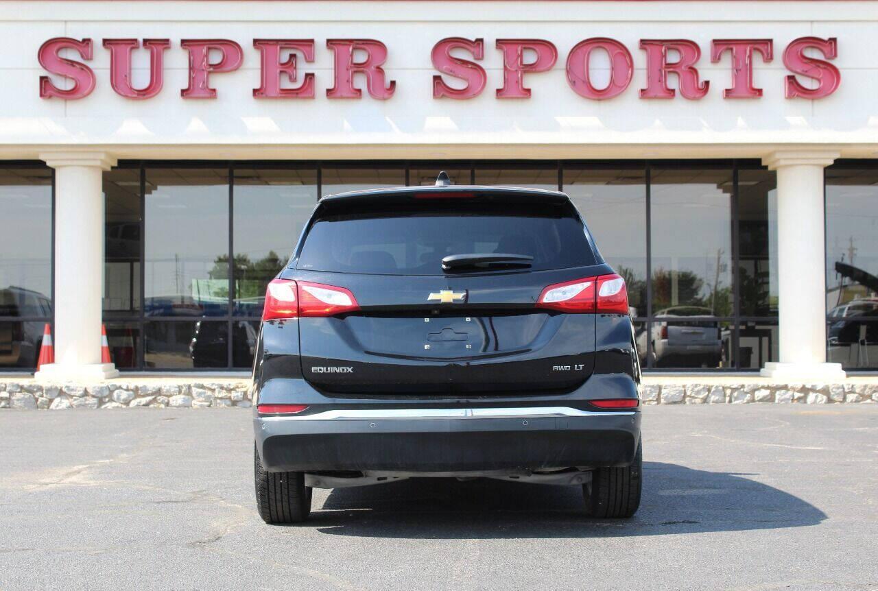 2018 Black Chevrolet Equinox LT AWD (2GNAXSEV7J6) with an 1.5L L4 DIR DOHC 16V TURBO engine, 6A transmission, located at 4301 NW 39th , Oklahoma City, OK, 73112, (405) 949-5600, 35.512135, -97.598671 - NO DRIVERS LICENCE -NO FULL COVERAGE INSURANCE - NO CREDIT CHECK. COME ON OVER TO SUPERSPORTS, TAKE A LOOK AND TEST DRIVE. PLEASE GIVE US A CALL AT (405) 949-5600. NO LICENCIA DE CONDUCIR - NO SEGURO DE COBERTURA TOTAL - NO VERIFICACION DE CREDITO. VISITENOS EN SUPERSPORTS, MIRE NUESTRO - Photo#4