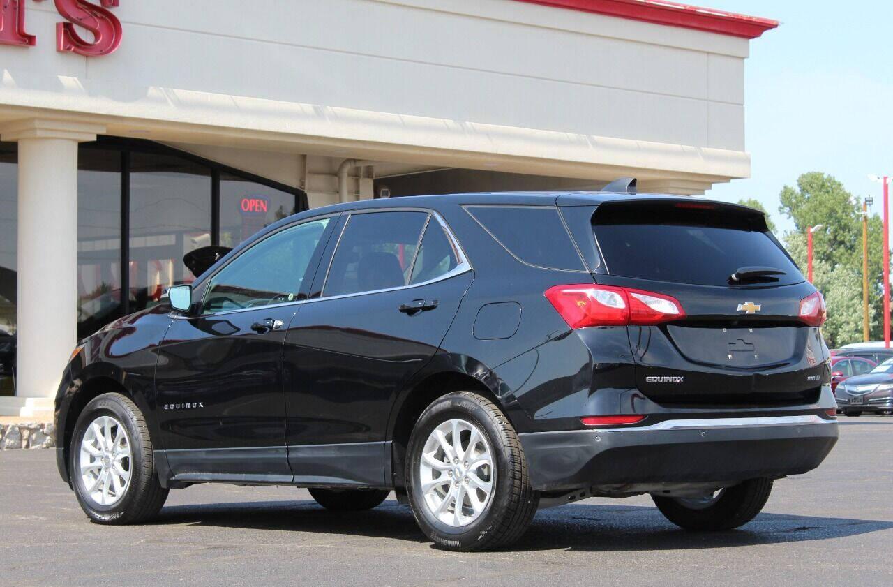 2018 Black Chevrolet Equinox LT AWD (2GNAXSEV7J6) with an 1.5L L4 DIR DOHC 16V TURBO engine, 6A transmission, located at 4301 NW 39th , Oklahoma City, OK, 73112, (405) 949-5600, 35.512135, -97.598671 - NO DRIVERS LICENCE -NO FULL COVERAGE INSURANCE - NO CREDIT CHECK. COME ON OVER TO SUPERSPORTS, TAKE A LOOK AND TEST DRIVE. PLEASE GIVE US A CALL AT (405) 949-5600. NO LICENCIA DE CONDUCIR - NO SEGURO DE COBERTURA TOTAL - NO VERIFICACION DE CREDITO. VISITENOS EN SUPERSPORTS, MIRE NUESTRO - Photo#5