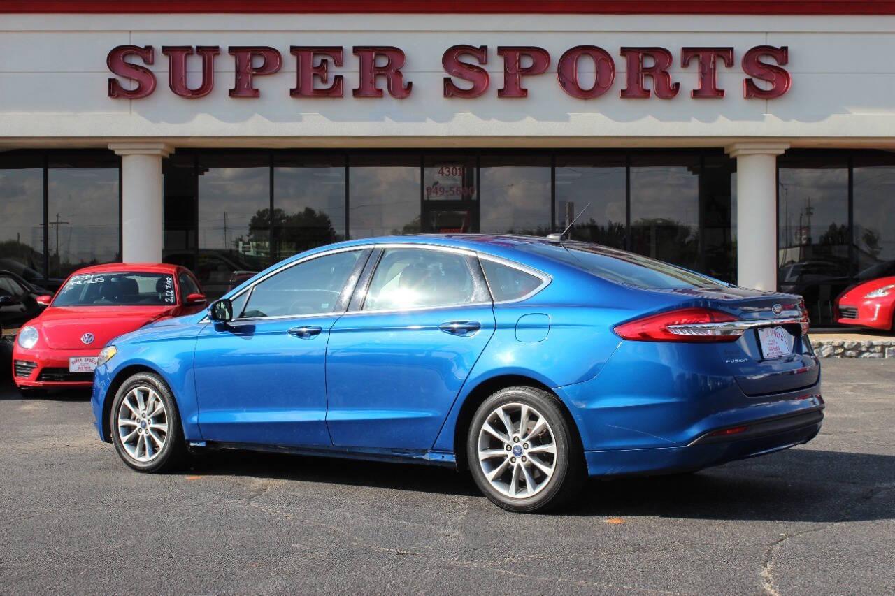 2017 Blue Ford Fusion SE (3FA6P0HD3HR) with an 1.5L L4 DOHC 16V engine, 6A transmission, located at 4301 NW 39th , Oklahoma City, OK, 73112, (405) 949-5600, 35.512135, -97.598671 - NO DRIVERS LICENCE -NO FULL COVERAGE INSURANCE - NO CREDIT CHECK. COME ON OVER TO SUPERSPORTS, TAKE A LOOK AND TEST DRIVE. PLEASE GIVE US A CALL AT (405) 949-5600. NO LICENCIA DE CONDUCIR - NO SEGURO DE COBERTURA TOTAL - NO VERIFICACION DE CREDITO. VISITENOS EN SUPERSPORTS, MIRE NUESTRO - Photo#4