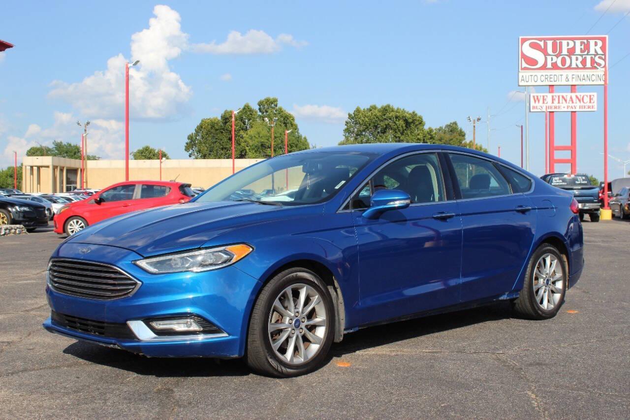 2017 Blue Ford Fusion SE (3FA6P0HD3HR) with an 1.5L L4 DOHC 16V engine, 6A transmission, located at 4301 NW 39th , Oklahoma City, OK, 73112, (405) 949-5600, 35.512135, -97.598671 - NO DRIVERS LICENCE -NO FULL COVERAGE INSURANCE - NO CREDIT CHECK. COME ON OVER TO SUPERSPORTS, TAKE A LOOK AND TEST DRIVE. PLEASE GIVE US A CALL AT (405) 949-5600. NO LICENCIA DE CONDUCIR - NO SEGURO DE COBERTURA TOTAL - NO VERIFICACION DE CREDITO. VISITENOS EN SUPERSPORTS, MIRE NUESTRO - Photo#6