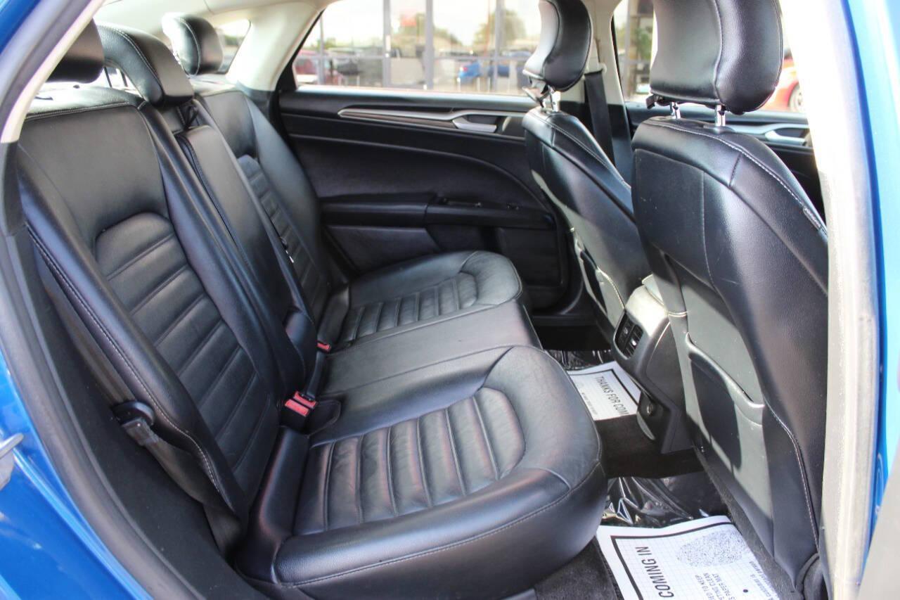 2017 Blue Ford Fusion SE (3FA6P0HD3HR) with an 1.5L L4 DOHC 16V engine, 6A transmission, located at 4301 NW 39th , Oklahoma City, OK, 73112, (405) 949-5600, 35.512135, -97.598671 - NO DRIVERS LICENCE -NO FULL COVERAGE INSURANCE - NO CREDIT CHECK. COME ON OVER TO SUPERSPORTS, TAKE A LOOK AND TEST DRIVE. PLEASE GIVE US A CALL AT (405) 949-5600. NO LICENCIA DE CONDUCIR - NO SEGURO DE COBERTURA TOTAL - NO VERIFICACION DE CREDITO. VISITENOS EN SUPERSPORTS, MIRE NUESTRO - Photo#10