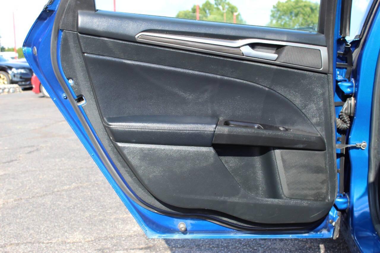 2017 Blue Ford Fusion SE (3FA6P0HD3HR) with an 1.5L L4 DOHC 16V engine, 6A transmission, located at 4301 NW 39th , Oklahoma City, OK, 73112, (405) 949-5600, 35.512135, -97.598671 - NO DRIVERS LICENCE -NO FULL COVERAGE INSURANCE - NO CREDIT CHECK. COME ON OVER TO SUPERSPORTS, TAKE A LOOK AND TEST DRIVE. PLEASE GIVE US A CALL AT (405) 949-5600. NO LICENCIA DE CONDUCIR - NO SEGURO DE COBERTURA TOTAL - NO VERIFICACION DE CREDITO. VISITENOS EN SUPERSPORTS, MIRE NUESTRO - Photo#14