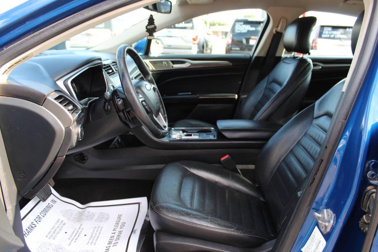 2017 Blue Ford Fusion SE (3FA6P0HD3HR) with an 1.5L L4 DOHC 16V engine, 6A transmission, located at 4301 NW 39th , Oklahoma City, OK, 73112, (405) 949-5600, 35.512135, -97.598671 - NO DRIVERS LICENCE -NO FULL COVERAGE INSURANCE - NO CREDIT CHECK. COME ON OVER TO SUPERSPORTS, TAKE A LOOK AND TEST DRIVE. PLEASE GIVE US A CALL AT (405) 949-5600. NO LICENCIA DE CONDUCIR - NO SEGURO DE COBERTURA TOTAL - NO VERIFICACION DE CREDITO. VISITENOS EN SUPERSPORTS, MIRE NUESTRO - Photo#15