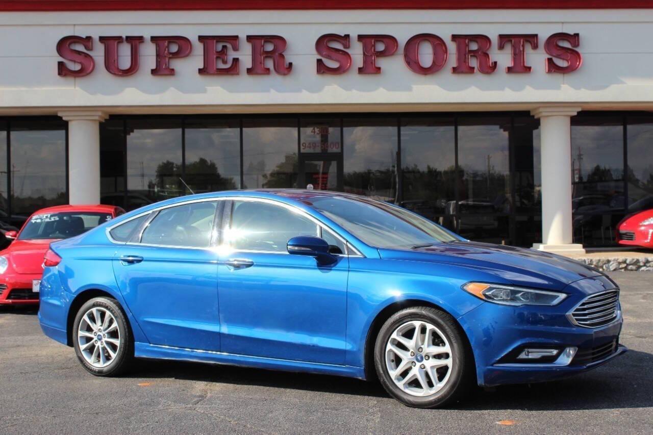 2017 Blue Ford Fusion SE (3FA6P0HD3HR) with an 1.5L L4 DOHC 16V engine, 6A transmission, located at 4301 NW 39th , Oklahoma City, OK, 73112, (405) 949-5600, 35.512135, -97.598671 - NO DRIVERS LICENCE -NO FULL COVERAGE INSURANCE - NO CREDIT CHECK. COME ON OVER TO SUPERSPORTS, TAKE A LOOK AND TEST DRIVE. PLEASE GIVE US A CALL AT (405) 949-5600. NO LICENCIA DE CONDUCIR - NO SEGURO DE COBERTURA TOTAL - NO VERIFICACION DE CREDITO. VISITENOS EN SUPERSPORTS, MIRE NUESTRO - Photo#0