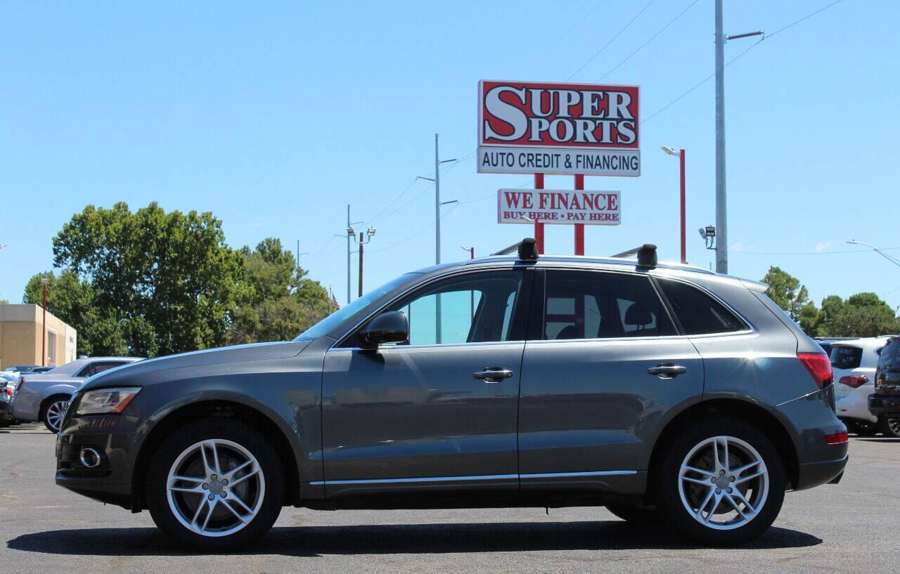 2015 Silver Audi Q5 2.0T Premium Plus quattro (WA1LFAFP3FA) with an 2.0L L4 DOHC 16V engine, 8-Speed Automatic transmission, located at 4301 NW 39th , Oklahoma City, OK, 73112, (405) 949-5600, 35.512135, -97.598671 - THIS VEHICLE HAS 4 BRAND NEW TIRES NO DRIVERS LICENCE - NO-FULL COVERAGE INSURANCE - NO CREDIT CHECK. COME ON OVER TO SUPERSPORTS AND TAKE A LOOK AND TEST DRIVE. PLEASE GIVE US A CALL AT (405) 949-5600. NO LICENCIA DE MANEJAR - NO SEGURO DE COBERTURA TOTAL - NO VERIFICACION DE CREDITO - Photo#12