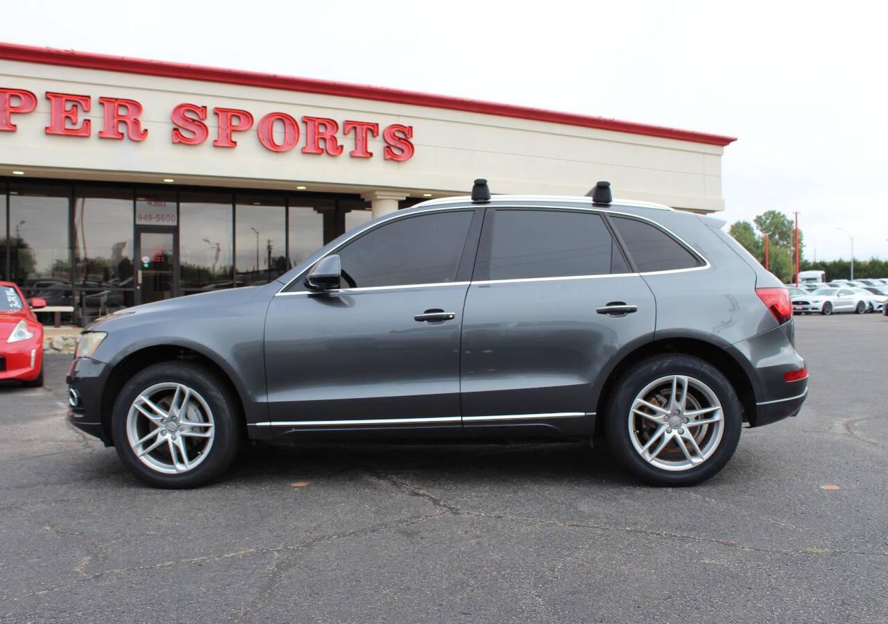 2015 Silver Audi Q5 2.0T Premium Plus quattro (WA1LFAFP3FA) with an 2.0L L4 DOHC 16V engine, 8-Speed Automatic transmission, located at 4301 NW 39th , Oklahoma City, OK, 73112, (405) 949-5600, 35.512135, -97.598671 - THIS VEHICLE HAS 4 BRAND NEW TIRES NO DRIVERS LICENCE - NO-FULL COVERAGE INSURANCE - NO CREDIT CHECK. COME ON OVER TO SUPERSPORTS AND TAKE A LOOK AND TEST DRIVE. PLEASE GIVE US A CALL AT (405) 949-5600. NO LICENCIA DE MANEJAR - NO SEGURO DE COBERTURA TOTAL - NO VERIFICACION DE CREDITO - Photo#1