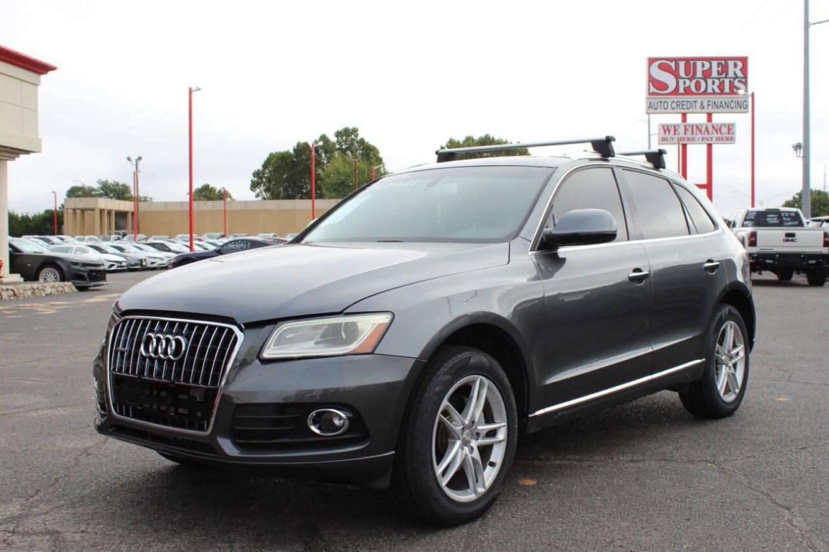 2015 Silver Audi Q5 2.0T Premium Plus quattro (WA1LFAFP3FA) with an 2.0L L4 DOHC 16V engine, 8-Speed Automatic transmission, located at 4301 NW 39th , Oklahoma City, OK, 73112, (405) 949-5600, 35.512135, -97.598671 - THIS VEHICLE HAS 4 BRAND NEW TIRES NO DRIVERS LICENCE - NO-FULL COVERAGE INSURANCE - NO CREDIT CHECK. COME ON OVER TO SUPERSPORTS AND TAKE A LOOK AND TEST DRIVE. PLEASE GIVE US A CALL AT (405) 949-5600. NO LICENCIA DE MANEJAR - NO SEGURO DE COBERTURA TOTAL - NO VERIFICACION DE CREDITO - Photo#2