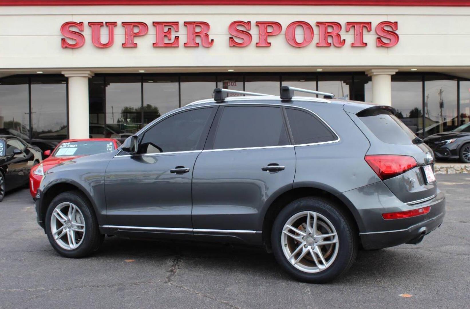 2015 Silver Audi Q5 2.0T Premium Plus quattro (WA1LFAFP3FA) with an 2.0L L4 DOHC 16V engine, 8-Speed Automatic transmission, located at 4301 NW 39th , Oklahoma City, OK, 73112, (405) 949-5600, 35.512135, -97.598671 - THIS VEHICLE HAS 4 BRAND NEW TIRES NO DRIVERS LICENCE - NO-FULL COVERAGE INSURANCE - NO CREDIT CHECK. COME ON OVER TO SUPERSPORTS AND TAKE A LOOK AND TEST DRIVE. PLEASE GIVE US A CALL AT (405) 949-5600. NO LICENCIA DE MANEJAR - NO SEGURO DE COBERTURA TOTAL - NO VERIFICACION DE CREDITO - Photo#3