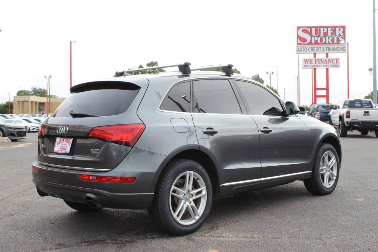 2015 Silver Audi Q5 2.0T Premium Plus quattro (WA1LFAFP3FA) with an 2.0L L4 DOHC 16V engine, 8-Speed Automatic transmission, located at 4301 NW 39th , Oklahoma City, OK, 73112, (405) 949-5600, 35.512135, -97.598671 - THIS VEHICLE HAS 4 BRAND NEW TIRES NO DRIVERS LICENCE - NO-FULL COVERAGE INSURANCE - NO CREDIT CHECK. COME ON OVER TO SUPERSPORTS AND TAKE A LOOK AND TEST DRIVE. PLEASE GIVE US A CALL AT (405) 949-5600. NO LICENCIA DE MANEJAR - NO SEGURO DE COBERTURA TOTAL - NO VERIFICACION DE CREDITO - Photo#5