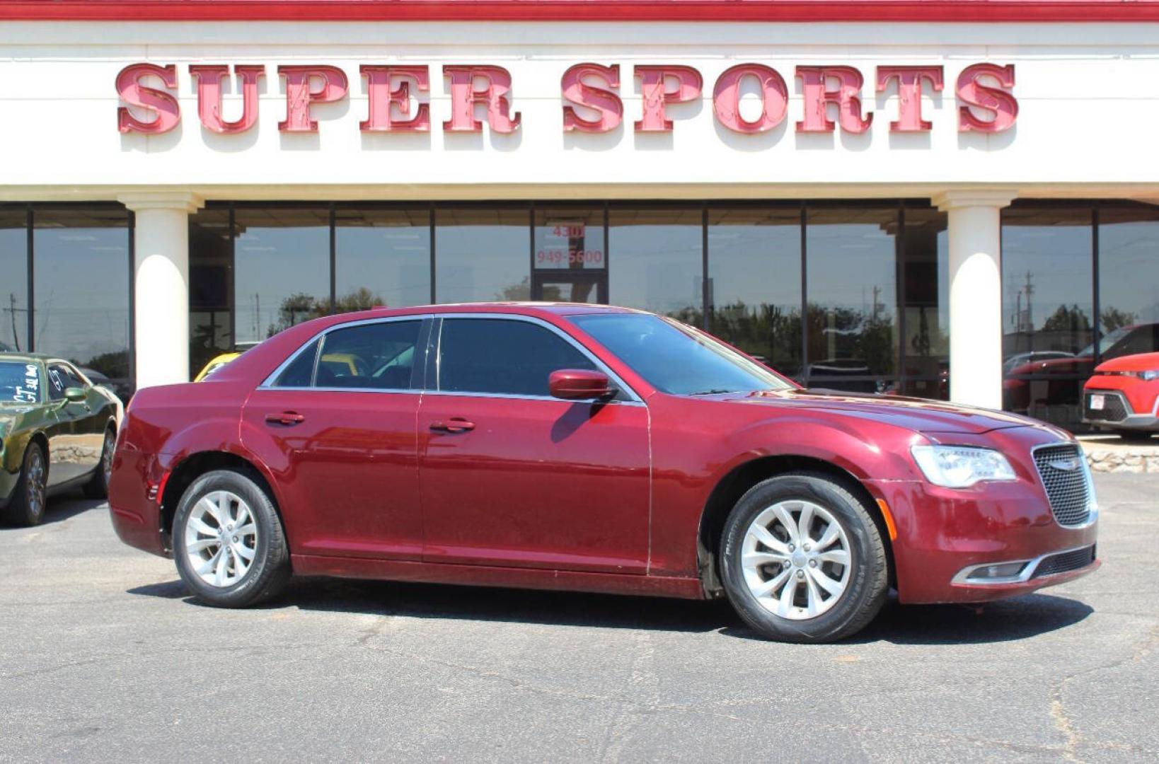 2015 Maroon Chrysler 300 Limited RWD (2C3CCAAG6FH) with an 3.6L V6 3.6L V6 engine, Automatic 8-Speed transmission, located at 4301 NW 39th , Oklahoma City, OK, 73112, (405) 949-5600, 35.512135, -97.598671 - Hablamos espanol. SPEND SMART --- BUY FROM SUPER SPORTS. ALL PRICES, DOWN PAYMENTS, PAYMENTS, AND FINANCE TERMS ARE NEGOTIABLE AT THE TIME OF APPROVAL. WE WILL WORK WITH YOU TO FIT YOUR BUDGET. WE WILL EVEN LOWER AND ADJUST THE NUMBERS TO HELP MAKE THE VEHICLE MORE AFFORDABLE FOR YOU.- Photo#0