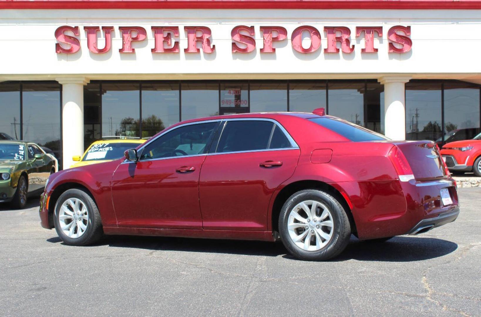 2015 Maroon Chrysler 300 Limited RWD (2C3CCAAG6FH) with an 3.6L V6 3.6L V6 engine, Automatic 8-Speed transmission, located at 4301 NW 39th , Oklahoma City, OK, 73112, (405) 949-5600, 35.512135, -97.598671 - Hablamos espanol. SPEND SMART --- BUY FROM SUPER SPORTS. ALL PRICES, DOWN PAYMENTS, PAYMENTS, AND FINANCE TERMS ARE NEGOTIABLE AT THE TIME OF APPROVAL. WE WILL WORK WITH YOU TO FIT YOUR BUDGET. WE WILL EVEN LOWER AND ADJUST THE NUMBERS TO HELP MAKE THE VEHICLE MORE AFFORDABLE FOR YOU.- Photo#4