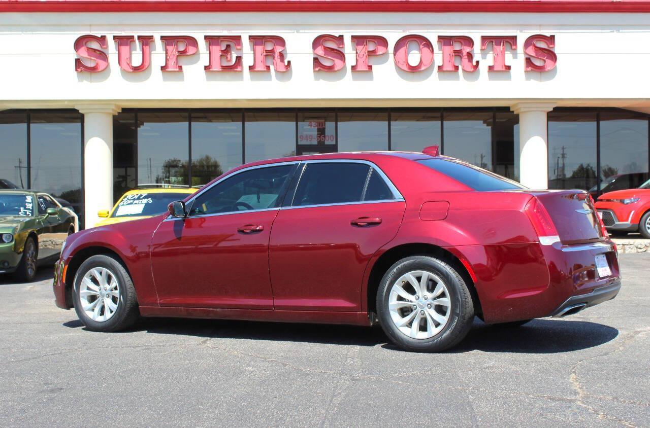 2015 Maroon Chrysler 300 Limited RWD (2C3CCAAG6FH) with an 3.6L V6 3.6L V6 engine, Automatic 8-Speed transmission, located at 4301 NW 39th , Oklahoma City, OK, 73112, (405) 949-5600, 35.512135, -97.598671 - Hablamos espanol. SPEND SMART --- BUY FROM SUPER SPORTS. ALL PRICES, DOWN PAYMENTS, PAYMENTS, AND FINANCE TERMS ARE NEGOTIABLE AT THE TIME OF APPROVAL. WE WILL WORK WITH YOU TO FIT YOUR BUDGET. WE WILL EVEN LOWER AND ADJUST THE NUMBERS TO HELP MAKE THE VEHICLE MORE AFFORDABLE FOR YOU.- Photo#4