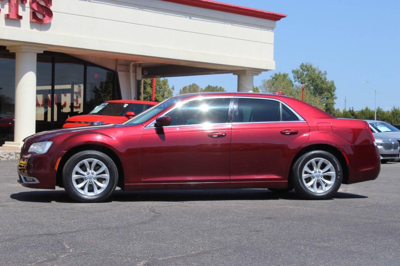 2015 Maroon Chrysler 300 Limited RWD (2C3CCAAG6FH) with an 3.6L V6 3.6L V6 engine, Automatic 8-Speed transmission, located at 4301 NW 39th , Oklahoma City, OK, 73112, (405) 949-5600, 35.512135, -97.598671 - Hablamos espanol. SPEND SMART --- BUY FROM SUPER SPORTS. ALL PRICES, DOWN PAYMENTS, PAYMENTS, AND FINANCE TERMS ARE NEGOTIABLE AT THE TIME OF APPROVAL. WE WILL WORK WITH YOU TO FIT YOUR BUDGET. WE WILL EVEN LOWER AND ADJUST THE NUMBERS TO HELP MAKE THE VEHICLE MORE AFFORDABLE FOR YOU.- Photo#5