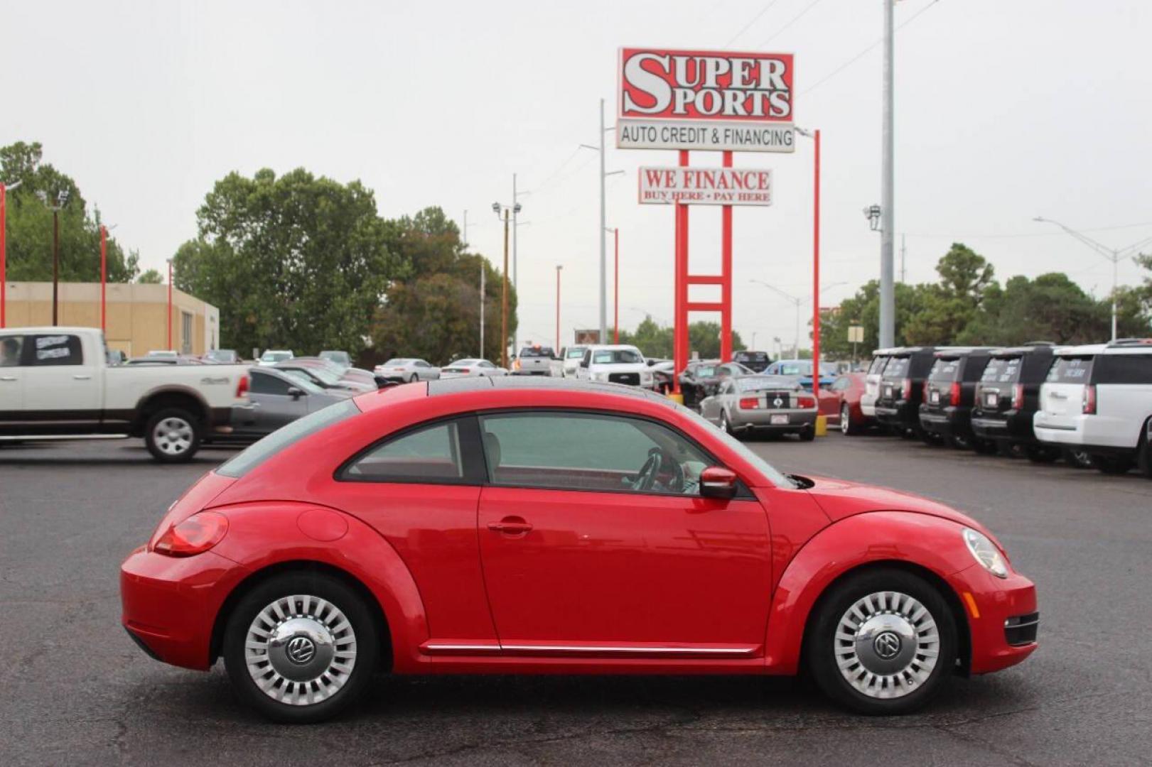 2014 Red Volkswagen Beetle 1.8T (3VWJ07AT9EM) with an 1.8L L4 DOHC 16V engine, Automatic 6-Speed transmission, located at 4301 NW 39th , Oklahoma City, OK, 73112, (405) 949-5600, 35.512135, -97.598671 - Photo#2