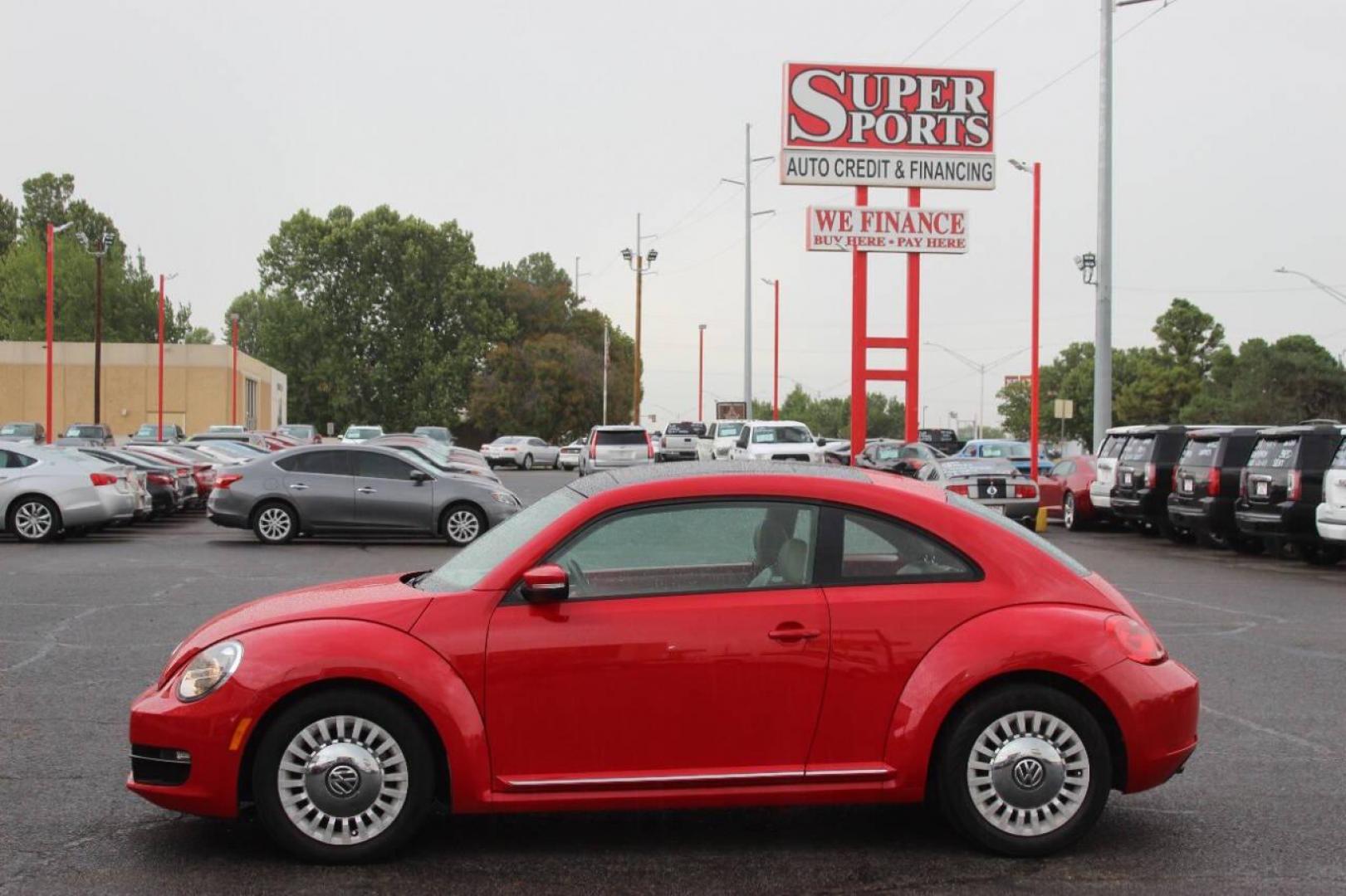 2014 Red Volkswagen Beetle 1.8T (3VWJ07AT9EM) with an 1.8L L4 DOHC 16V engine, Automatic 6-Speed transmission, located at 4301 NW 39th , Oklahoma City, OK, 73112, (405) 949-5600, 35.512135, -97.598671 - Photo#5