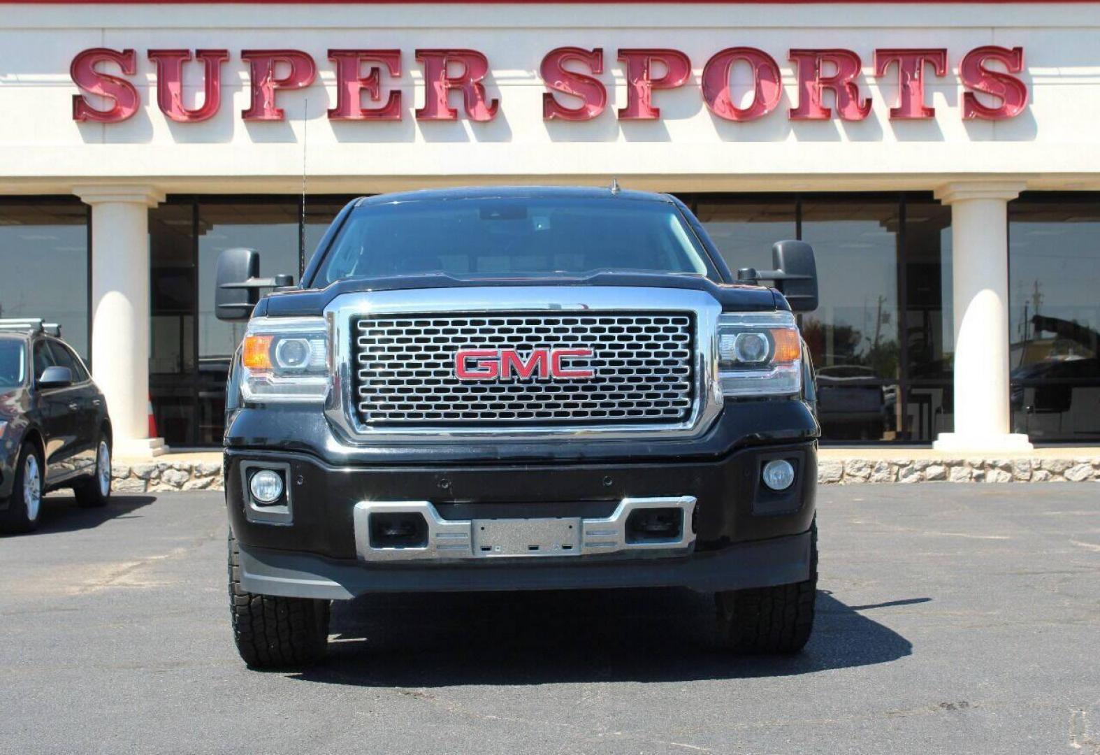 2014 Black GMC Sierra 1500 Denali Crew Cab 4WD (3GTU2WEJ6EG) with an 6.2L V8 OHV 16V engine, 6-Speed Automatic transmission, located at 4301 NW 39th , Oklahoma City, OK, 73112, (405) 949-5600, 35.512135, -97.598671 - NO DRIVERS LICENCE NO-FULL COVERAGE INSURANCE-NO CREDIT CHECK. COME ON OVER TO SUPERSPORTS AND TAKE A LOOK AND TEST DRIVE. PLEASE GIVE US A CALL AT (405) 949-5600. NO LICENSIA DE MANEJAR- NO SEGURO DE COBERTURA TOTAL- NO VERIFICACCION DE CREDITO. POR FAVOR VENGAN A SUPERSPORTS, ECHE UN - Photo#2