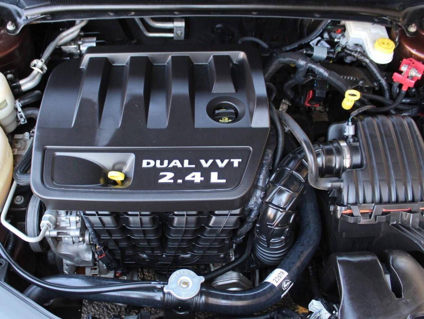 2013 Brown Chrysler 200 LX (1C3CCBAB2DN) with an 2.4L L4 DOHC 16V engine, 6-Speed Automatic transmission, located at 4301 NW 39th , Oklahoma City, OK, 73112, (405) 949-5600, 35.512135, -97.598671 - Photo#7