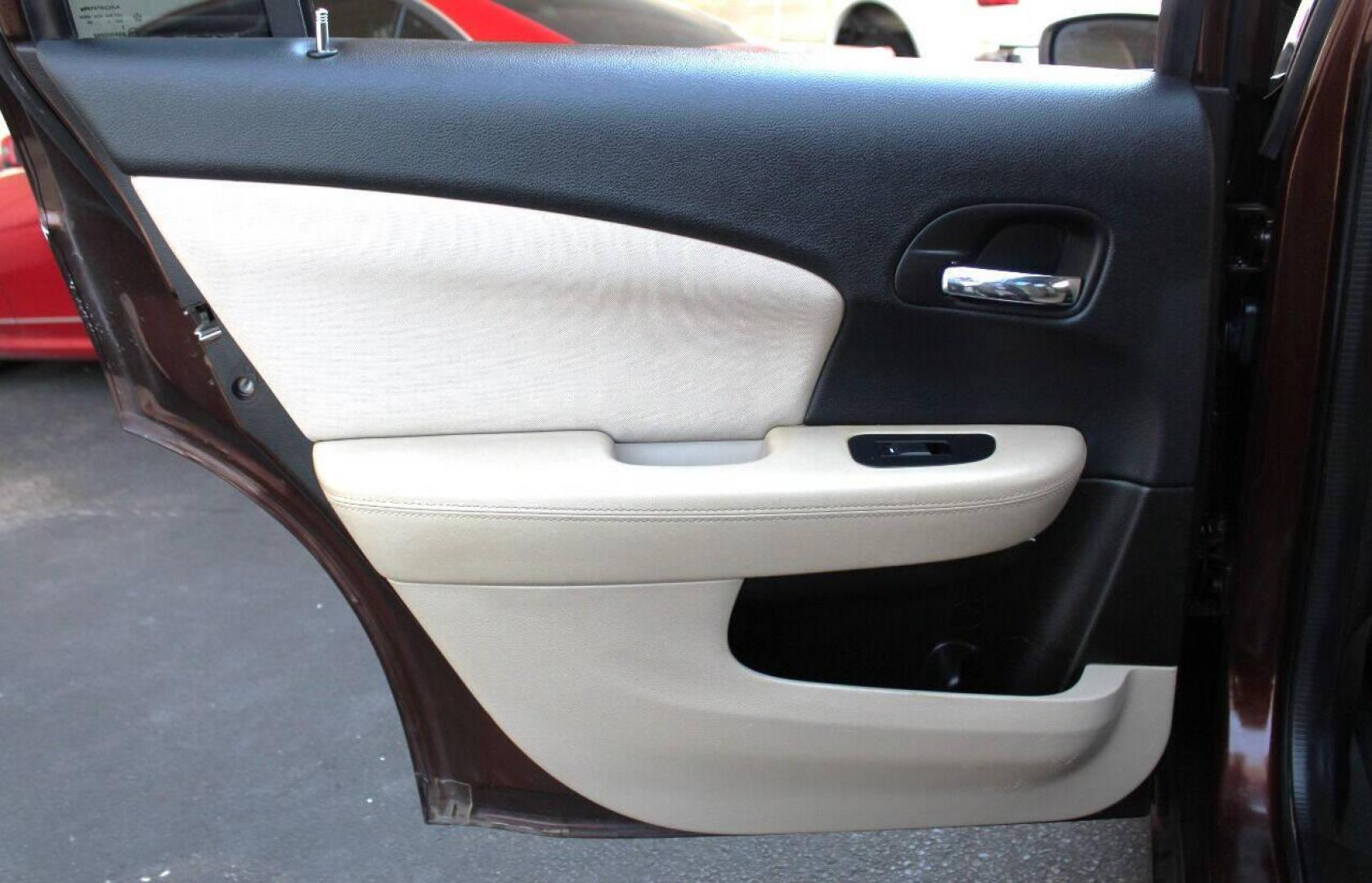 2013 Brown Chrysler 200 LX (1C3CCBAB2DN) with an 2.4L L4 DOHC 16V engine, 6-Speed Automatic transmission, located at 4301 NW 39th , Oklahoma City, OK, 73112, (405) 949-5600, 35.512135, -97.598671 - Photo#13