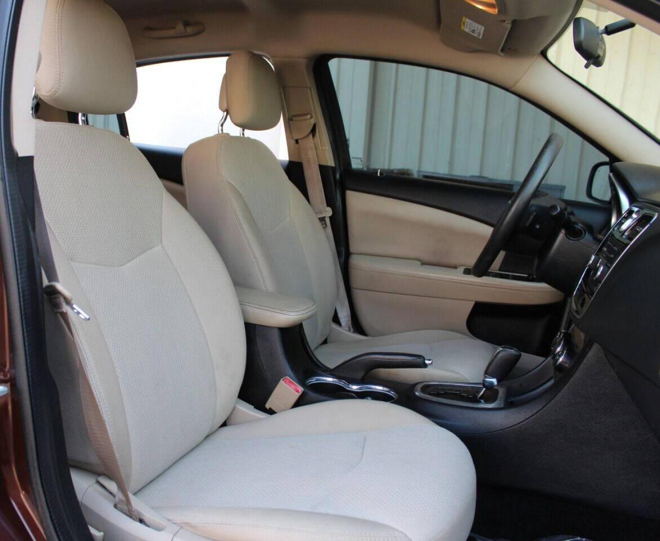 2013 Brown Chrysler 200 LX (1C3CCBAB2DN) with an 2.4L L4 DOHC 16V engine, 6-Speed Automatic transmission, located at 4301 NW 39th , Oklahoma City, OK, 73112, (405) 949-5600, 35.512135, -97.598671 - Photo#9
