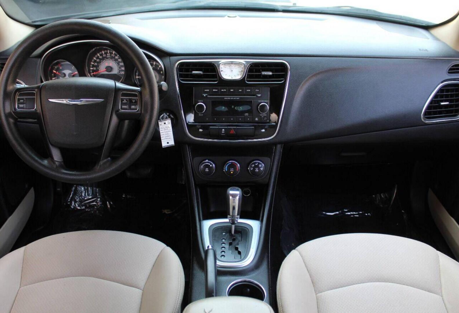 2013 Brown Chrysler 200 LX (1C3CCBAB2DN) with an 2.4L L4 DOHC 16V engine, 6-Speed Automatic transmission, located at 4301 NW 39th , Oklahoma City, OK, 73112, (405) 949-5600, 35.512135, -97.598671 - Photo#17