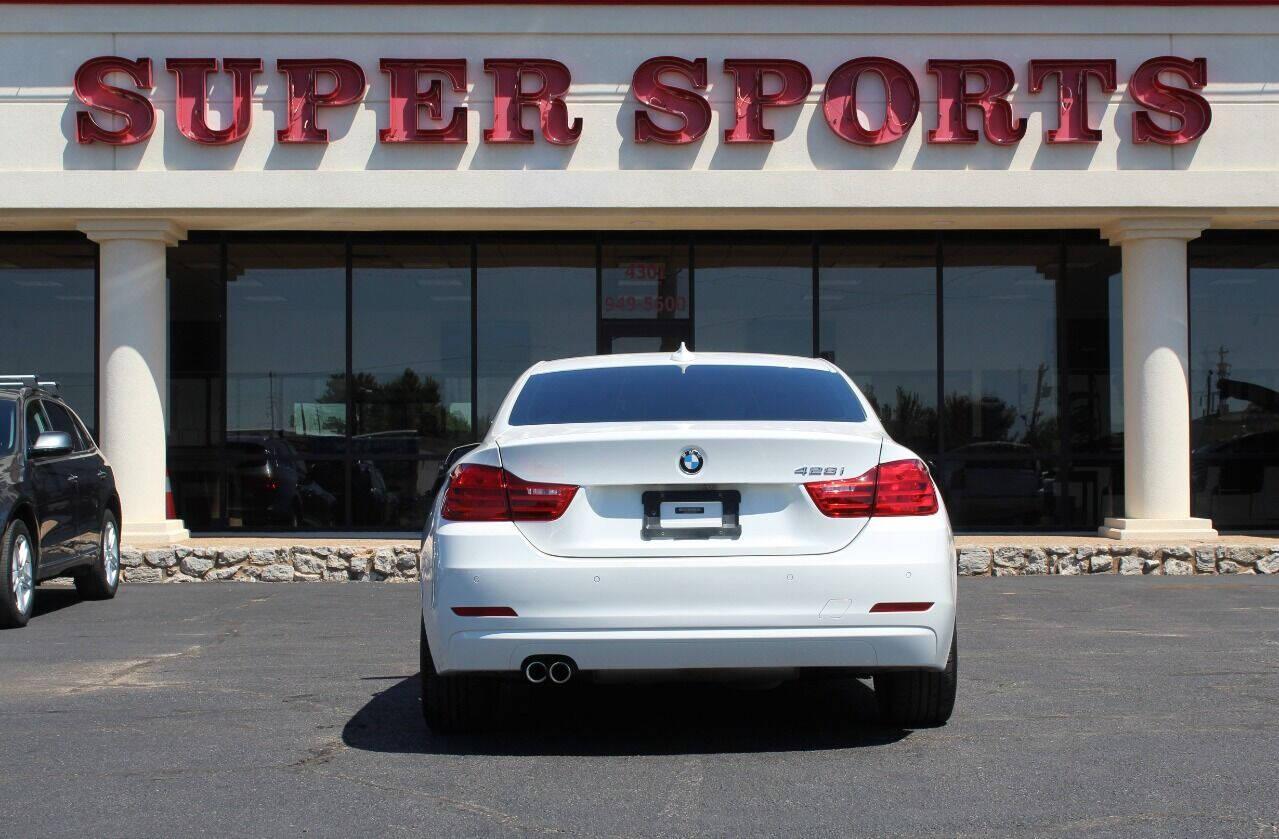 2014 White BMW 4 Series 428i coupe (WBA3N3C55EK) with an 2.0L I4 Turbocharger 2.0L I4 engine, Automatic 8-Speed transmission, located at 4301 NW 39th , Oklahoma City, OK, 73112, (405) 949-5600, 35.512135, -97.598671 - NO DRIVERS LICENCE NO-FULL COVERAGE INSURANCE-NO CREDIT CHECK. COME ON OVER TO SUPERSPORTS AND TAKE A LOOK AND TEST DRIVE PLEASE GIVE US A CALL AT (405) 949-5600. NO LICENSIA DE MANEJAR- NO SEGURO DE COBERTURA TOTAL- NO VERIFICACCION DE CREDITO. POR FAVOR VENGAN A SUPERSPORTS, ECHE UN VISTAZO Y - Photo#4