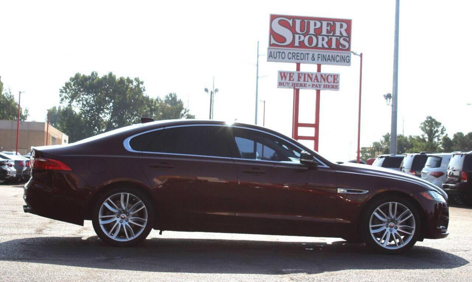 2016 Burgundy Jaguar XF-Series XF Prestige (SAJBE4BV1GC) with an 3.0L V6 DOHC 24V SUPERCHARGED engine, 8A transmission, located at 4301 NW 39th , Oklahoma City, OK, 73112, (405) 949-5600, 35.512135, -97.598671 - NO DRIVERS LICENCE NO-FULL COVERAGE INSURANCE-NO CREDIT CHECK. COME ON OVER TO SUPERSPORTS AND TAKE A LOOK AND TEST DRIVE PLEASE GIVE US A CALL AT (405) 949-5600. NO LICENSIA DE MANEJAR- NO SEGURO DE COBERTURA TOTAL- NO VERIFICACCION DE CREDITO. POR FAVOR VENGAN A SUPERSPORTS, ECHE UN V - Photo#2