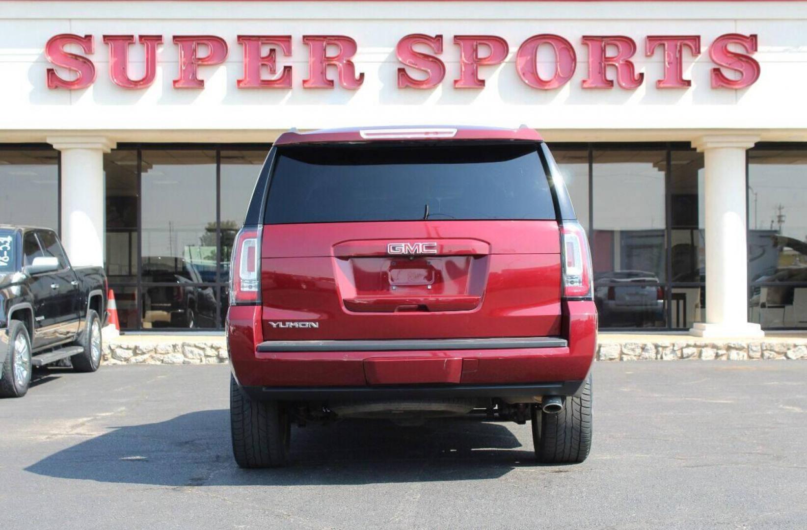 2017 Maroon GMC Yukon SLE 2WD (1GKS1AKC1HR) with an 5.3L V8 OHV 16V engine, 6A transmission, located at 4301 NW 39th , Oklahoma City, OK, 73112, (405) 949-5600, 35.512135, -97.598671 - NO DRIVERS LICENCE NO-FULL COVERAGE INSURANCE-NO CREDIT CHECK. COME ON OVER TO SUPERSPORTS AND TAKE A LOOK AND TEST DRIVE. PLEASE GIVE US A CALL AT (405) 949-5600. NO LICENSIA DE MANEJAR- NO SEGURO DE COBERTURA TOTAL- NO VERIFICACCION DE CREDITO. POR FAVOR VENGAN A SUPERSPORTS, ECHE UN - Photo#4