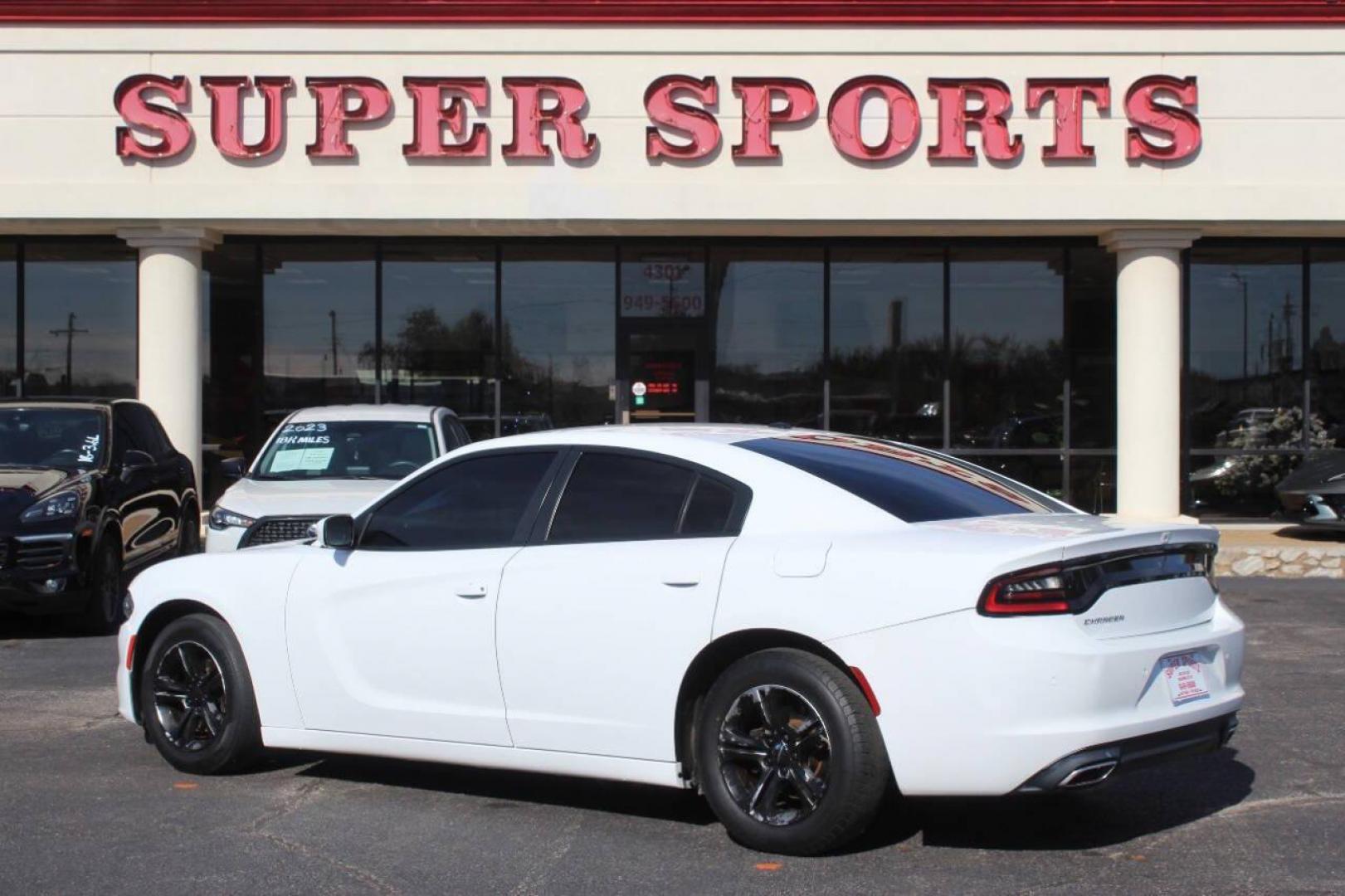 2019 White Dodge Charger SXT (2C3CDXBG8KH) with an 3.6L V6 DOHC 24V engine, 8A transmission, located at 4301 NW 39th , Oklahoma City, OK, 73112, (405) 949-5600, 35.512135, -97.598671 - NO DRIVERS LICENCE NO-FULL COVERAGE INSURANCE-NO CREDIT CHECK. COME ON OVER TO SUPERSPORTS AND TAKE A LOOK AND TEST DRIVE. PLEASE GIVE US A CALL AT (405) 949-5600. NO LICENSIA DE MANEJAR- NO SEGURO DE COBERTURA TOTAL- NO VERIFICACCION DE CREDITO. POR FAVOR VENGAN A SUPERSPORTS, ECHE UN - Photo#5