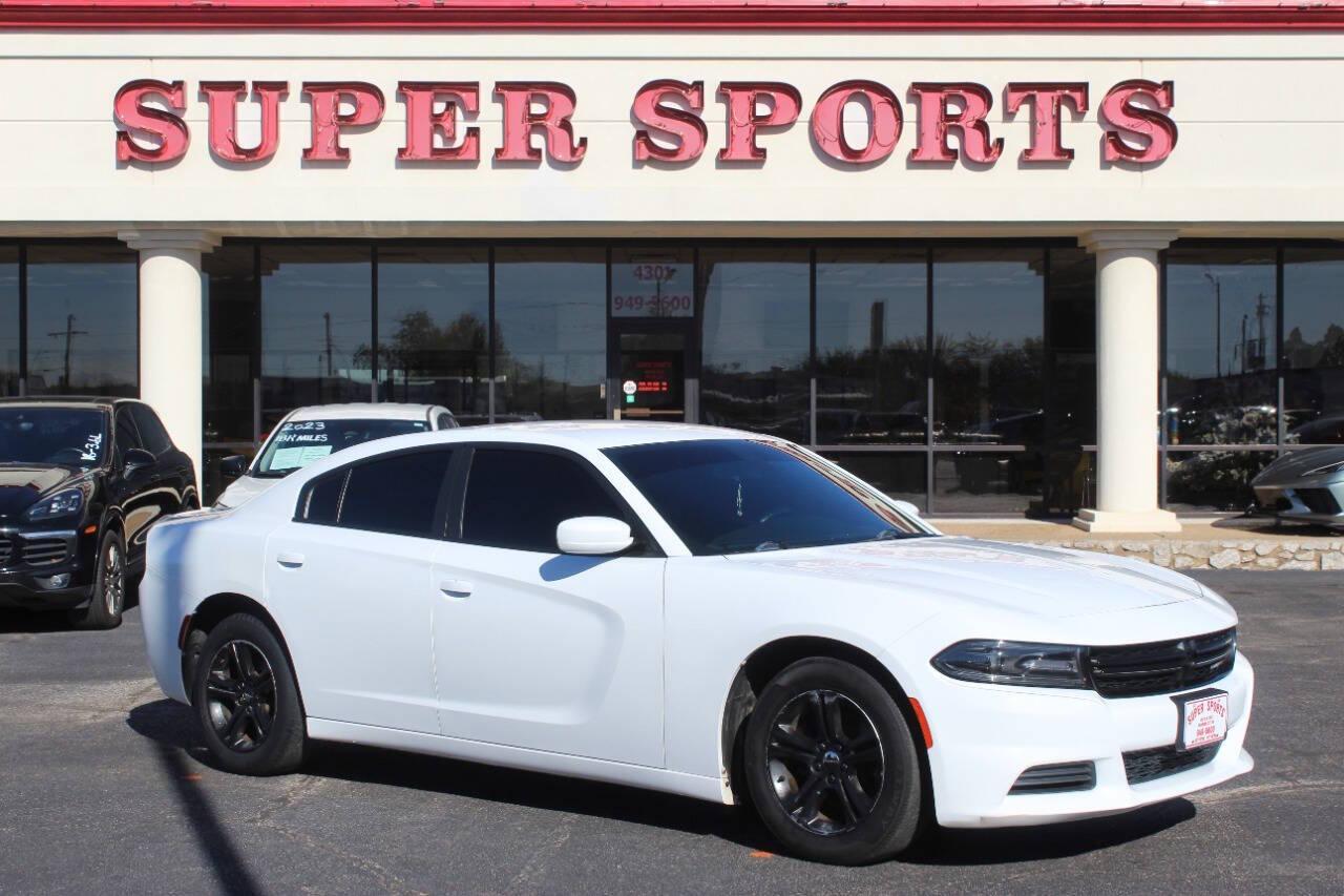 2019 White Dodge Charger SXT (2C3CDXBG8KH) with an 3.6L V6 DOHC 24V engine, 8A transmission, located at 4301 NW 39th , Oklahoma City, OK, 73112, (405) 949-5600, 35.512135, -97.598671 - NO DRIVERS LICENCE -NO FULL COVERAGE INSURANCE - NO CREDIT CHECK. COME ON OVER TO SUPERSPORTS, TAKE A LOOK AND TEST DRIVE. PLEASE GIVE US A CALL AT (405) 949-5600. NO LICENCIA DE CONDUCIR - NO SEGURO DE COBERTURA TOTAL - NO VERIFICACION DE CREDITO. VISITENOS EN SUPERSPORTS, MIRE NUESTRO - Photo#0