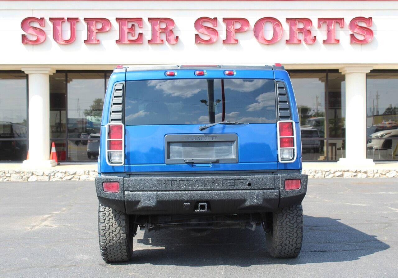 2006 Blue HUMMER H2 SUV (5GRGN23U16H) with an 6.0L V8 6.0L V8 engine, Automatic 4-Speed transmission, located at 4301 NW 39th , Oklahoma City, OK, 73112, (405) 949-5600, 35.512135, -97.598671 - NO DRIVERS LICENCE NO-FULL COVERAGE INSURANCE-NO CREDIT CHECK. COME ON OVER TO SUPERSPORTS AND TAKE A LOOK AND TEST DRIVE PLEASE GIVE US A CALL AT (405) 949-5600. NO LICENSIA DE MANEJAR- NO SEGURO DE COBERTURA TOTAL- NO VERIFICACCION DE CREDITO. POR FAVOR VENGAN A SUPERSPORTS, ECHE UN VIS - Photo#4