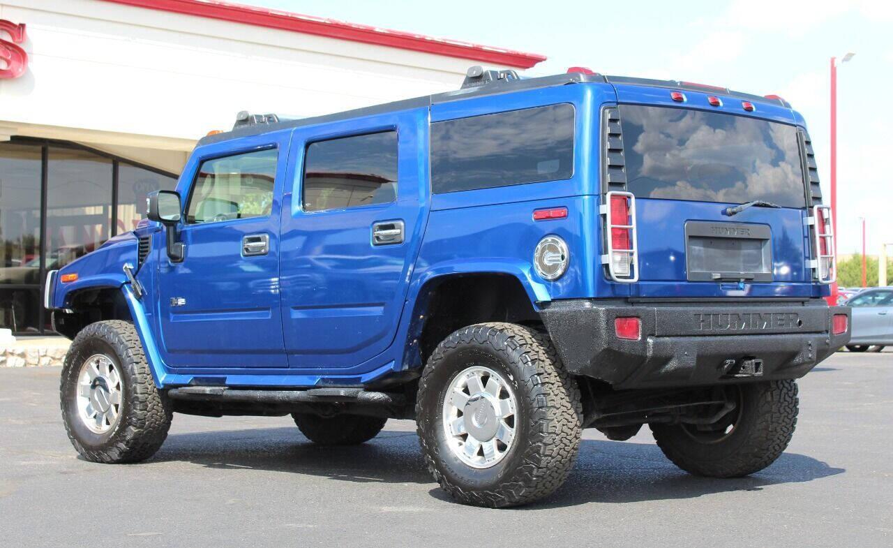 2006 Blue HUMMER H2 SUV (5GRGN23U16H) with an 6.0L V8 6.0L V8 engine, Automatic 4-Speed transmission, located at 4301 NW 39th , Oklahoma City, OK, 73112, (405) 949-5600, 35.512135, -97.598671 - NO DRIVERS LICENCE NO-FULL COVERAGE INSURANCE-NO CREDIT CHECK. COME ON OVER TO SUPERSPORTS AND TAKE A LOOK AND TEST DRIVE PLEASE GIVE US A CALL AT (405) 949-5600. NO LICENSIA DE MANEJAR- NO SEGURO DE COBERTURA TOTAL- NO VERIFICACCION DE CREDITO. POR FAVOR VENGAN A SUPERSPORTS, ECHE UN VIS - Photo#5