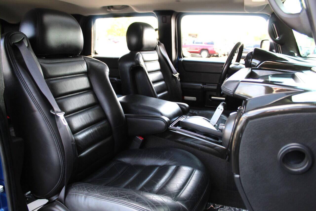 2006 Blue HUMMER H2 SUV (5GRGN23U16H) with an 6.0L V8 6.0L V8 engine, Automatic 4-Speed transmission, located at 4301 NW 39th , Oklahoma City, OK, 73112, (405) 949-5600, 35.512135, -97.598671 - NO DRIVERS LICENCE NO-FULL COVERAGE INSURANCE-NO CREDIT CHECK. COME ON OVER TO SUPERSPORTS AND TAKE A LOOK AND TEST DRIVE PLEASE GIVE US A CALL AT (405) 949-5600. NO LICENSIA DE MANEJAR- NO SEGURO DE COBERTURA TOTAL- NO VERIFICACCION DE CREDITO. POR FAVOR VENGAN A SUPERSPORTS, ECHE UN VIS - Photo#9