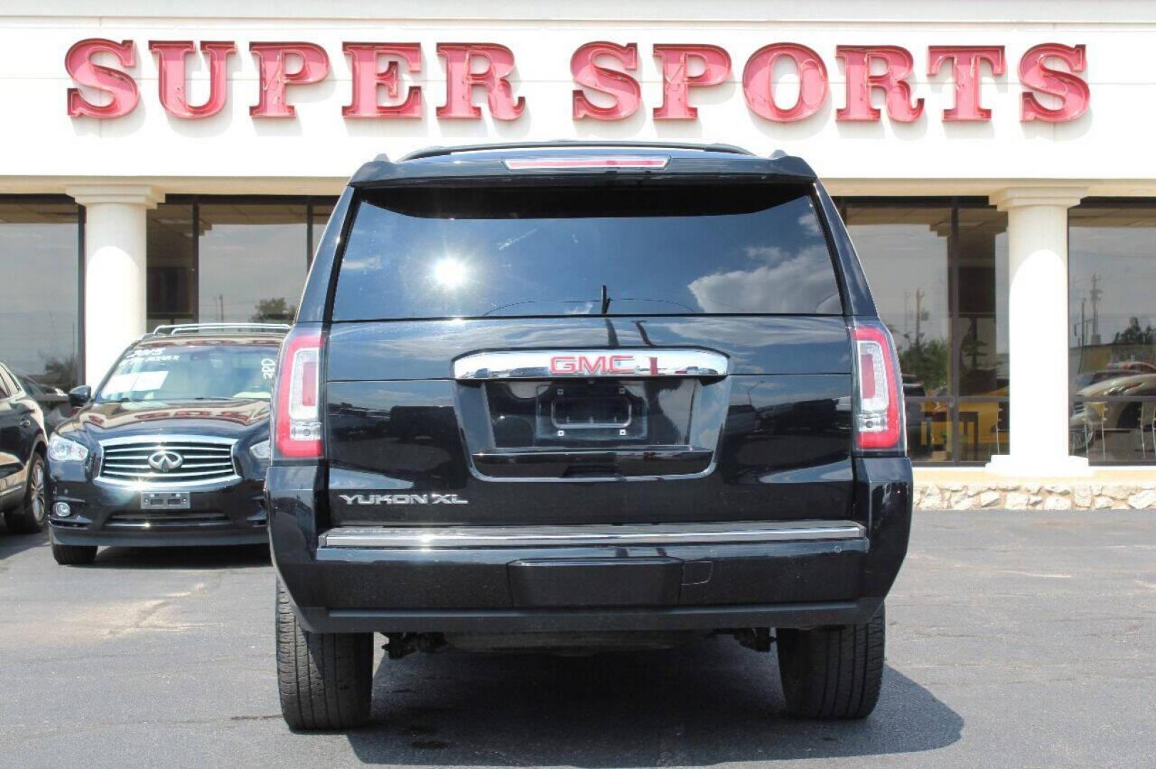 2016 Black GMC Yukon XL Denali 4WD (1GKS2HKJXGR) with an 6.2L V8 OHV 16V engine, 6A transmission, located at 4301 NW 39th , Oklahoma City, OK, 73112, (405) 949-5600, 35.512135, -97.598671 - NO DRIVERS LICENSE - NO FULL COVERAGE INSURANCE - NO CREDIT CHECK. COME ON OVER TO SUPERSPORTS AND TAKE A LOOK AND TEST DRIVE. PLEASE GIVE US A CALL AT (405) 949-5600. NO LICENCIA DE MANEJAR - NO SEGURO DE COBERTURA TOTAL - NO VERIFICACION DE CREDITO. POR FAVOR VENGAN A SUPERSPORTS, ECH - Photo#5