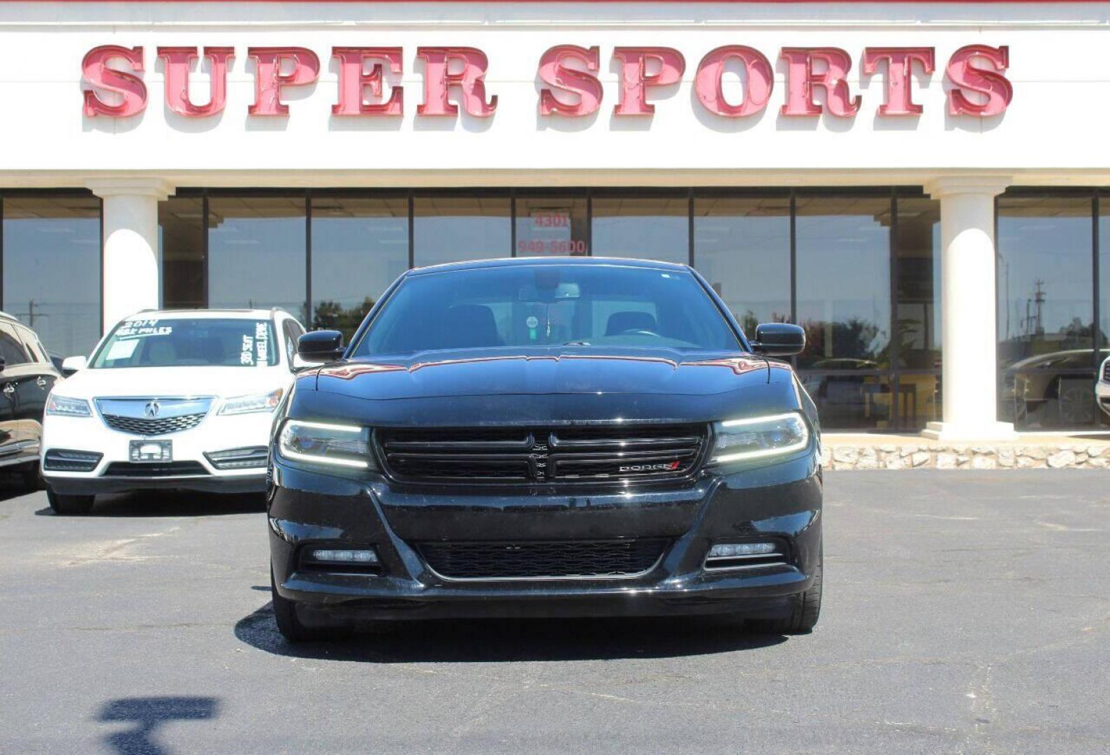 2018 Black Dodge Charger SXT (2C3CDXHG3JH) with an 3.6L V6 DOHC 24V engine, 8A transmission, located at 4301 NW 39th , Oklahoma City, OK, 73112, (405) 949-5600, 35.512135, -97.598671 - NO DRIVERS LICENSE - NOFULL COVERAGE INSURANCE - NO CREDIT CHECK. COME ON OVER TO SUPERSPORTS AND TAKE A LOOK AND TEST DRIVE. PLEASE GIVE US A CALL AT (405) 949-5600. NO LICENCIA DE MANEJAR - NO SEGURO DE COBERTURA TOTAL - NO VERIFICACION DE CREDITO. POR FAVOR VENGAN A SUPERSPORTS, ECHE - Photo#3