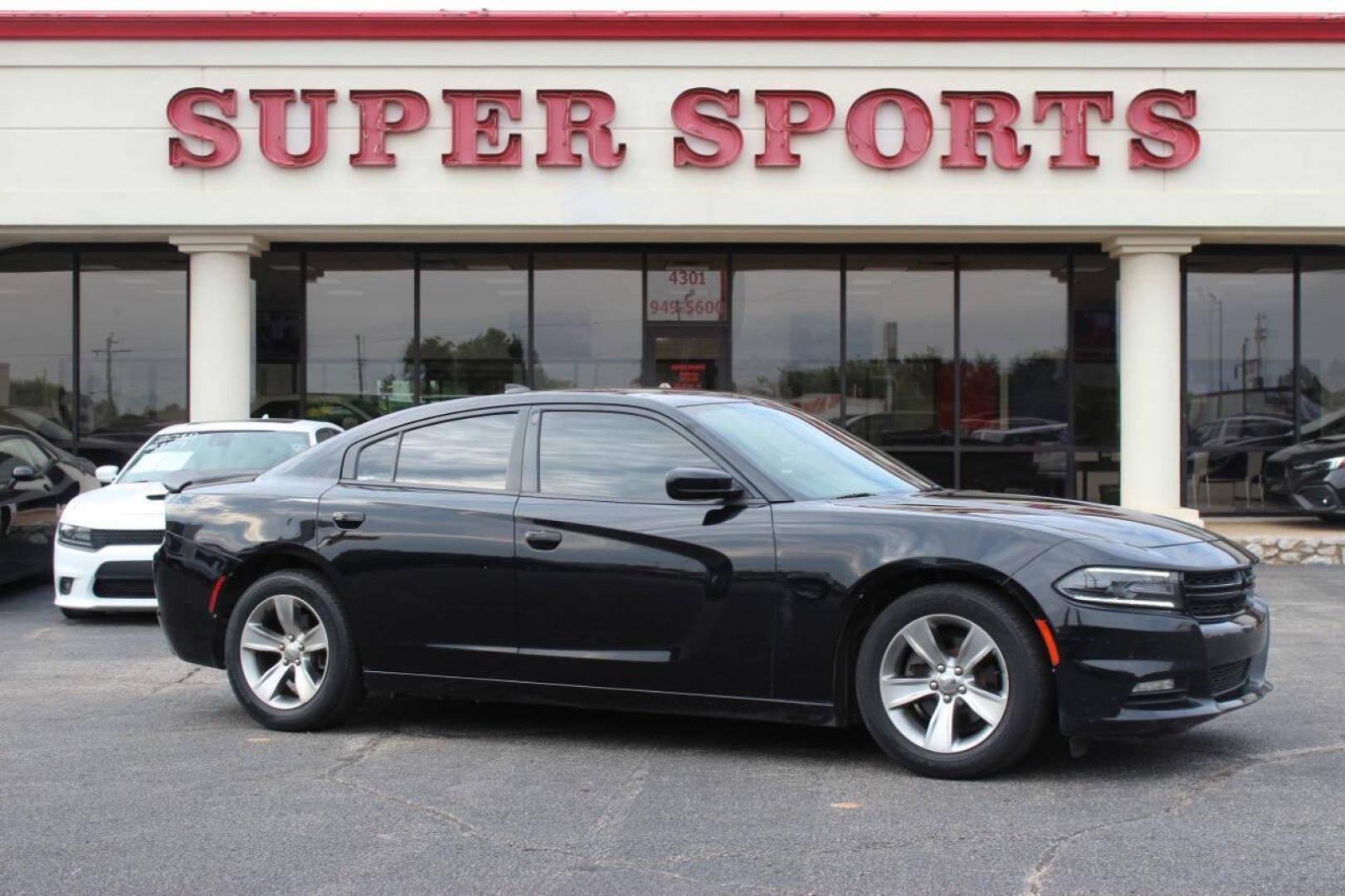 2018 Black Dodge Charger SXT (2C3CDXHG3JH) with an 3.6L V6 DOHC 24V engine, 8A transmission, located at 4301 NW 39th , Oklahoma City, OK, 73112, (405) 949-5600, 35.512135, -97.598671 - NO DRIVERS LICENCE NO-FULL COVERAGE INSURANCE-NO CREDIT CHECK. COME ON OVER TO SUPERSPORTS AND TAKE A LOOK AND TEST DRIVE. PLEASE GIVE US A CALL AT (405) 949-5600. NO LICENSIA DE MANEJAR- NO SEGURO DE COBERTURA TOTAL- NO VERIFICACCION DE CREDITO. POR FAVOR VENGAN A SUPERSPORTS, ECHE UN - Photo#2