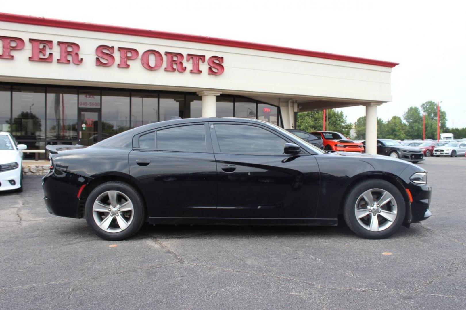 2018 Black Dodge Charger SXT (2C3CDXHG3JH) with an 3.6L V6 DOHC 24V engine, 8A transmission, located at 4301 NW 39th , Oklahoma City, OK, 73112, (405) 949-5600, 35.512135, -97.598671 - NO DRIVERS LICENCE NO-FULL COVERAGE INSURANCE-NO CREDIT CHECK. COME ON OVER TO SUPERSPORTS AND TAKE A LOOK AND TEST DRIVE. PLEASE GIVE US A CALL AT (405) 949-5600. NO LICENSIA DE MANEJAR- NO SEGURO DE COBERTURA TOTAL- NO VERIFICACCION DE CREDITO. POR FAVOR VENGAN A SUPERSPORTS, ECHE UN - Photo#3