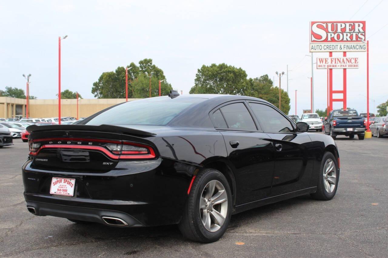 2018 Black Dodge Charger SXT (2C3CDXHG3JH) with an 3.6L V6 DOHC 24V engine, 8A transmission, located at 4301 NW 39th , Oklahoma City, OK, 73112, (405) 949-5600, 35.512135, -97.598671 - NO DRIVERS LICENCE NO-FULL COVERAGE INSURANCE-NO CREDIT CHECK. COME ON OVER TO SUPERSPORTS AND TAKE A LOOK AND TEST DRIVE. PLEASE GIVE US A CALL AT (405) 949-5600. NO LICENSIA DE MANEJAR- NO SEGURO DE COBERTURA TOTAL- NO VERIFICACCION DE CREDITO. POR FAVOR VENGAN A SUPERSPORTS, ECHE UN - Photo#3
