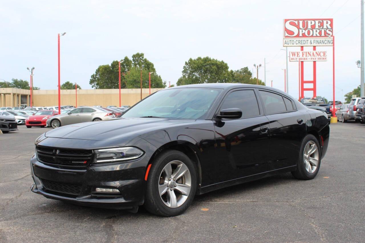 2018 Black Dodge Charger SXT (2C3CDXHG3JH) with an 3.6L V6 DOHC 24V engine, 8A transmission, located at 4301 NW 39th , Oklahoma City, OK, 73112, (405) 949-5600, 35.512135, -97.598671 - NO DRIVERS LICENCE NO-FULL COVERAGE INSURANCE-NO CREDIT CHECK. COME ON OVER TO SUPERSPORTS AND TAKE A LOOK AND TEST DRIVE. PLEASE GIVE US A CALL AT (405) 949-5600. NO LICENSIA DE MANEJAR- NO SEGURO DE COBERTURA TOTAL- NO VERIFICACCION DE CREDITO. POR FAVOR VENGAN A SUPERSPORTS, ECHE UN - Photo#6