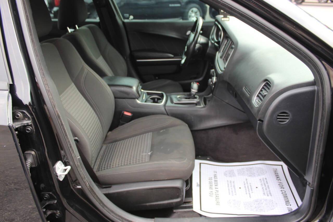2018 Black Dodge Charger SXT (2C3CDXHG3JH) with an 3.6L V6 DOHC 24V engine, 8A transmission, located at 4301 NW 39th , Oklahoma City, OK, 73112, (405) 949-5600, 35.512135, -97.598671 - NO DRIVERS LICENCE NO-FULL COVERAGE INSURANCE-NO CREDIT CHECK. COME ON OVER TO SUPERSPORTS AND TAKE A LOOK AND TEST DRIVE. PLEASE GIVE US A CALL AT (405) 949-5600. NO LICENSIA DE MANEJAR- NO SEGURO DE COBERTURA TOTAL- NO VERIFICACCION DE CREDITO. POR FAVOR VENGAN A SUPERSPORTS, ECHE UN - Photo#8