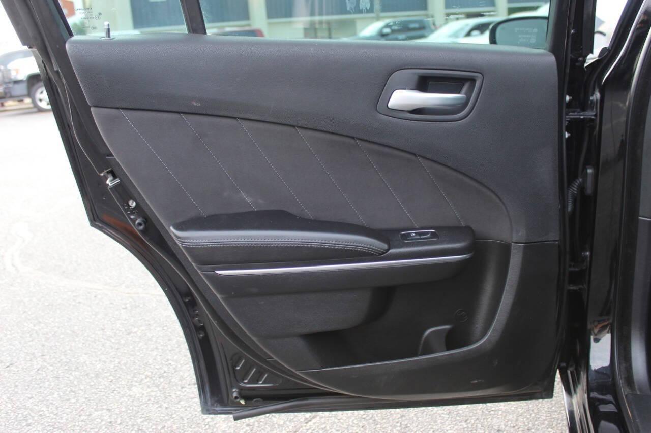 2018 Black Dodge Charger SXT (2C3CDXHG3JH) with an 3.6L V6 DOHC 24V engine, 8A transmission, located at 4301 NW 39th , Oklahoma City, OK, 73112, (405) 949-5600, 35.512135, -97.598671 - NO DRIVERS LICENCE NO-FULL COVERAGE INSURANCE-NO CREDIT CHECK. COME ON OVER TO SUPERSPORTS AND TAKE A LOOK AND TEST DRIVE. PLEASE GIVE US A CALL AT (405) 949-5600. NO LICENSIA DE MANEJAR- NO SEGURO DE COBERTURA TOTAL- NO VERIFICACCION DE CREDITO. POR FAVOR VENGAN A SUPERSPORTS, ECHE UN - Photo#14