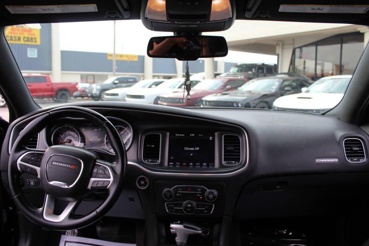 2018 Black Dodge Charger SXT (2C3CDXHG3JH) with an 3.6L V6 DOHC 24V engine, 8A transmission, located at 4301 NW 39th , Oklahoma City, OK, 73112, (405) 949-5600, 35.512135, -97.598671 - NO DRIVERS LICENCE NO-FULL COVERAGE INSURANCE-NO CREDIT CHECK. COME ON OVER TO SUPERSPORTS AND TAKE A LOOK AND TEST DRIVE. PLEASE GIVE US A CALL AT (405) 949-5600. NO LICENSIA DE MANEJAR- NO SEGURO DE COBERTURA TOTAL- NO VERIFICACCION DE CREDITO. POR FAVOR VENGAN A SUPERSPORTS, ECHE UN - Photo#17