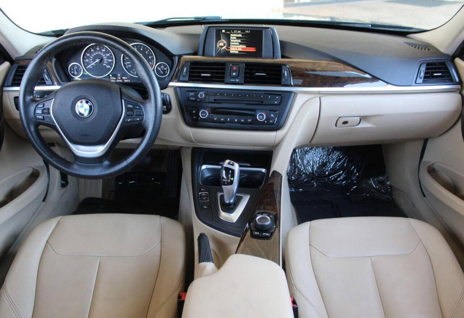 2015 Black BMW 3-Series 328i xDrive Sedan (WBA3B5G56FN) with an 2.0L L4 DOHC 16V engine, 8-Speed Automatic transmission, located at 4301 NW 39th , Oklahoma City, OK, 73112, (405) 949-5600, 35.512135, -97.598671 - Photo#17