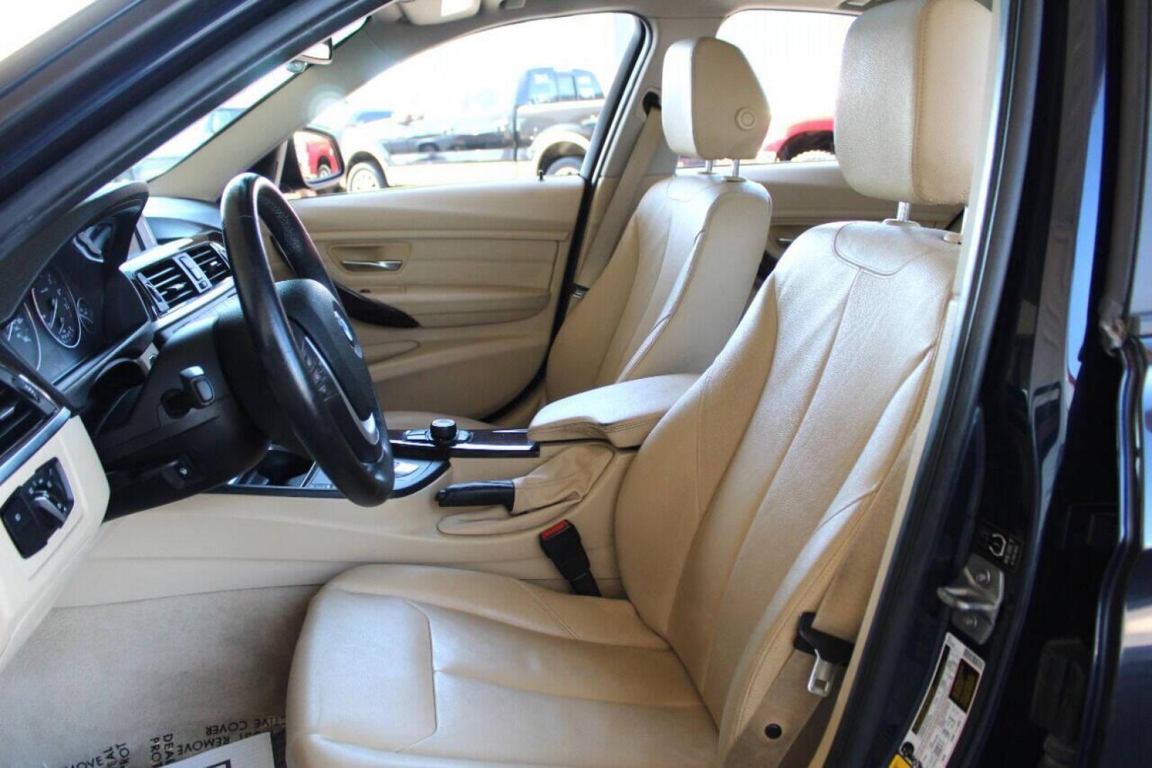 2015 Black BMW 3-Series 328i xDrive Sedan (WBA3B5G56FN) with an 2.0L L4 DOHC 16V engine, 8-Speed Automatic transmission, located at 4301 NW 39th , Oklahoma City, OK, 73112, (405) 949-5600, 35.512135, -97.598671 - Photo#16