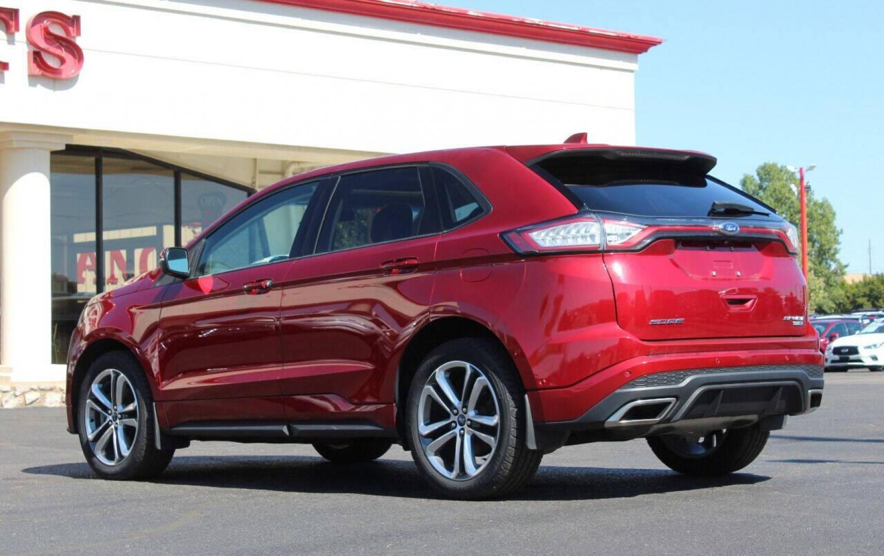 2016 Red Ford Edge Sport AWD (2FMPK4AP6GB) with an 2.7L V6 DOCH 24V engine, 6A transmission, located at 4301 NW 39th , Oklahoma City, OK, 73112, (405) 949-5600, 35.512135, -97.598671 - NO DRIVERS LICENCE - NO FULL COVERAGE INSURANCE - NO CREDIT CHECK. COME ON OVER TO SUPERSPORTS AND TAKE A LOOK AND TEST DRIVE. PLEASE GIVE US A CALL AT (405) 949-5600. NO LICENCIA DE MANEJAR - NO SEGURO DE COBERTURA TOTAL - NO VERIFICACION DE CREDITO. POR FAVOR VENGAN A SUPERSPORTS, ECH - Photo#5