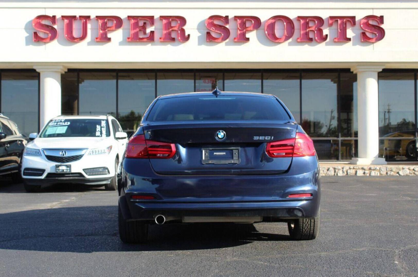 2016 Blue BMW 3-Series 320i Sedan (WBA8E1G58GN) with an 2.0L L4 DOHC 16V engine, 8A transmission, located at 4301 NW 39th , Oklahoma City, OK, 73112, (405) 949-5600, 35.512135, -97.598671 - NO DRIVERS LICENSE - NO FULL COVERAGE INSURANCE - NO CREDIT CHECK. COME ON OVER TO SUPERSPORTS AND TAKE A LOOK AND TEST DRIVE. PLEASE GIVE US A CALL AT (405) 949-5600. NO LICENCIA DE MANEJAR - NO SEGURO DE COBERTURA TOTAL - NO VERIFICACION DE CREDITO. POR FAVOR VENGAN A SUPERSPORTS, ECH - Photo#5