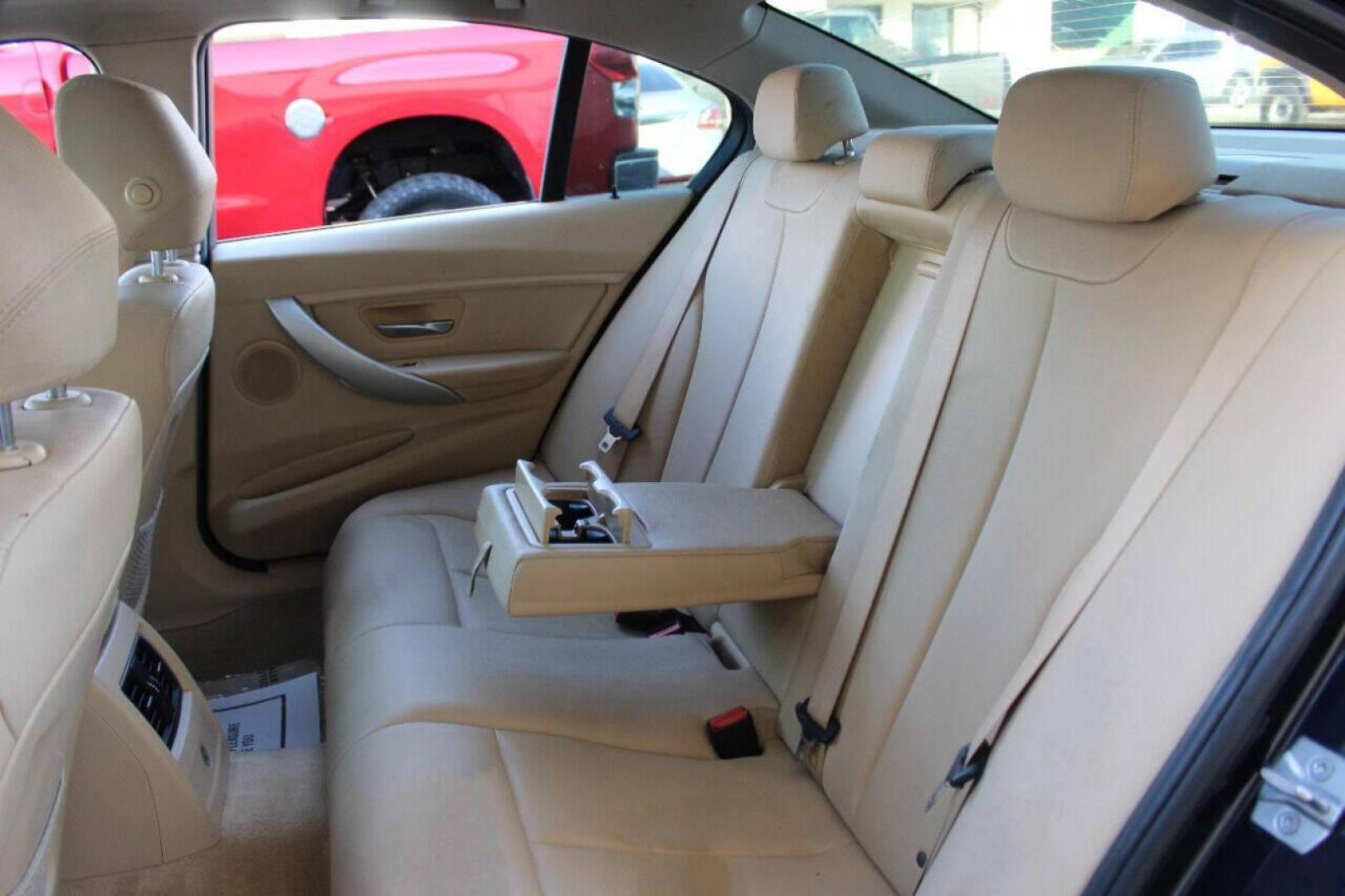 2016 Blue BMW 3-Series 320i Sedan (WBA8E1G58GN) with an 2.0L L4 DOHC 16V engine, 8A transmission, located at 4301 NW 39th , Oklahoma City, OK, 73112, (405) 949-5600, 35.512135, -97.598671 - NO DRIVERS LICENSE - NO FULL COVERAGE INSURANCE - NO CREDIT CHECK. COME ON OVER TO SUPERSPORTS AND TAKE A LOOK AND TEST DRIVE. PLEASE GIVE US A CALL AT (405) 949-5600. NO LICENCIA DE MANEJAR - NO SEGURO DE COBERTURA TOTAL - NO VERIFICACION DE CREDITO. POR FAVOR VENGAN A SUPERSPORTS, ECH - Photo#15