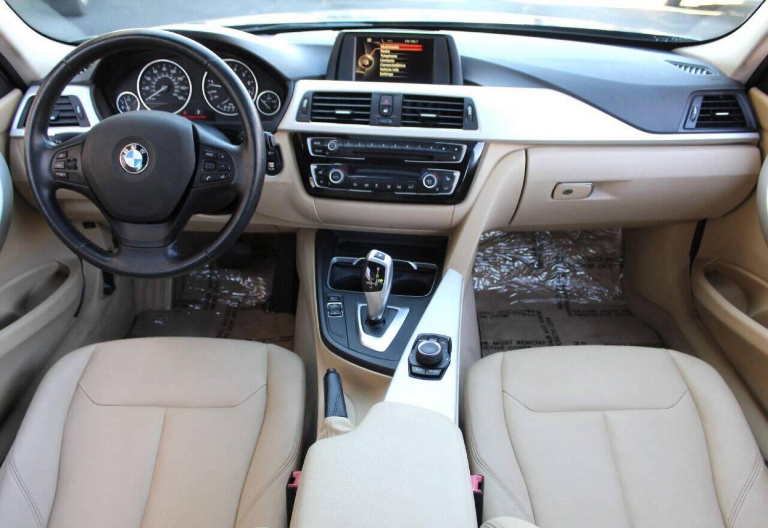 2016 Blue BMW 3-Series 320i Sedan (WBA8E1G58GN) with an 2.0L L4 DOHC 16V engine, 8A transmission, located at 4301 NW 39th , Oklahoma City, OK, 73112, (405) 949-5600, 35.512135, -97.598671 - NO DRIVERS LICENSE - NO FULL COVERAGE INSURANCE - NO CREDIT CHECK. COME ON OVER TO SUPERSPORTS AND TAKE A LOOK AND TEST DRIVE. PLEASE GIVE US A CALL AT (405) 949-5600. NO LICENCIA DE MANEJAR - NO SEGURO DE COBERTURA TOTAL - NO VERIFICACION DE CREDITO. POR FAVOR VENGAN A SUPERSPORTS, ECH - Photo#18