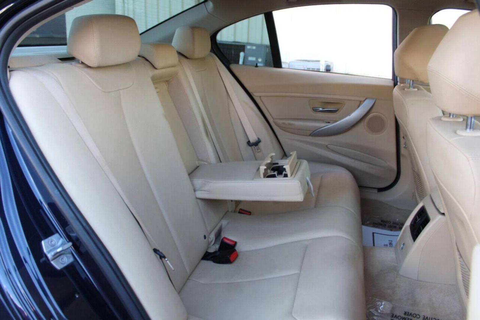 2016 Blue BMW 3-Series 320i Sedan (WBA8E1G58GN) with an 2.0L L4 DOHC 16V engine, 8A transmission, located at 4301 NW 39th , Oklahoma City, OK, 73112, (405) 949-5600, 35.512135, -97.598671 - NO DRIVERS LICENSE - NO FULL COVERAGE INSURANCE - NO CREDIT CHECK. COME ON OVER TO SUPERSPORTS AND TAKE A LOOK AND TEST DRIVE. PLEASE GIVE US A CALL AT (405) 949-5600. NO LICENCIA DE MANEJAR - NO SEGURO DE COBERTURA TOTAL - NO VERIFICACION DE CREDITO. POR FAVOR VENGAN A SUPERSPORTS, ECH - Photo#12